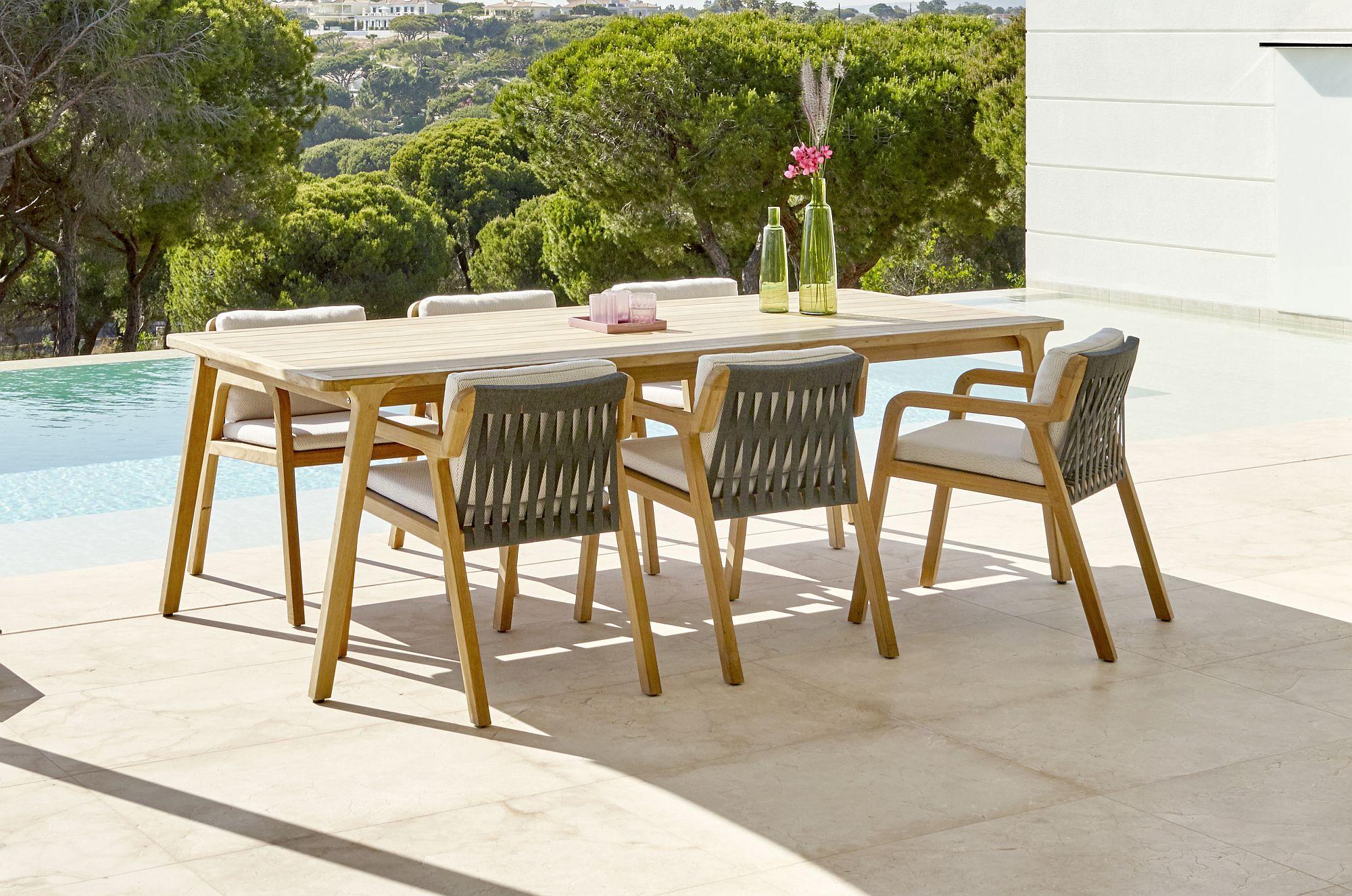 Product photograph of Skyline Flex Natural Teak Wood Outdoor 8 Seater Dining Table - 240cm from Choice Furniture Superstore.
