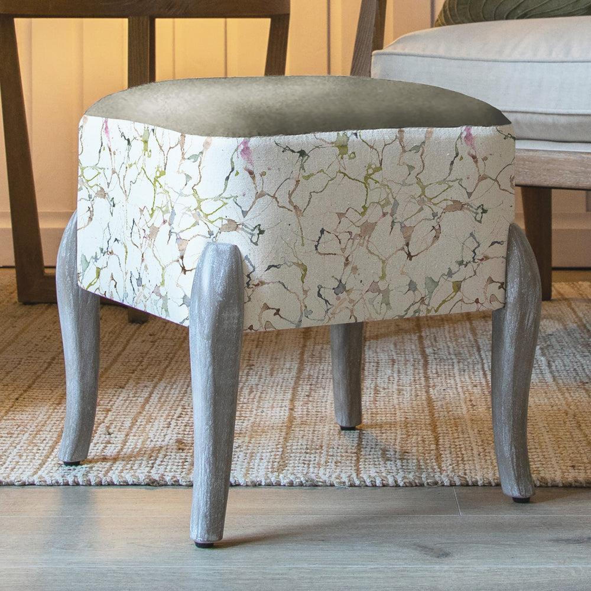 Product photograph of Voyage Maison Carrara Meadow Printed Ralf Footstool from Choice Furniture Superstore.