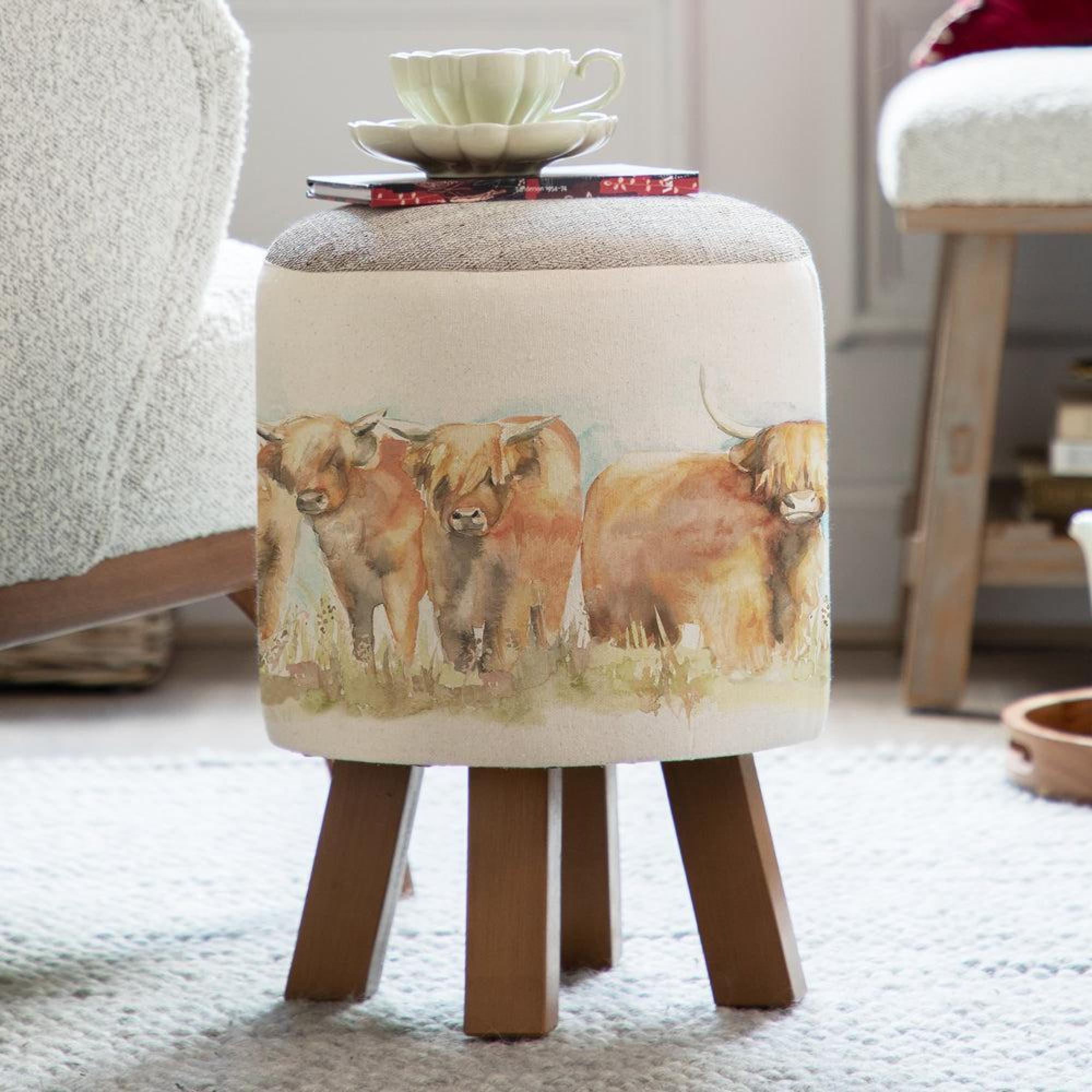 Product photograph of Voyage Maison Highland Cattle Monty Round Footstool from Choice Furniture Superstore.