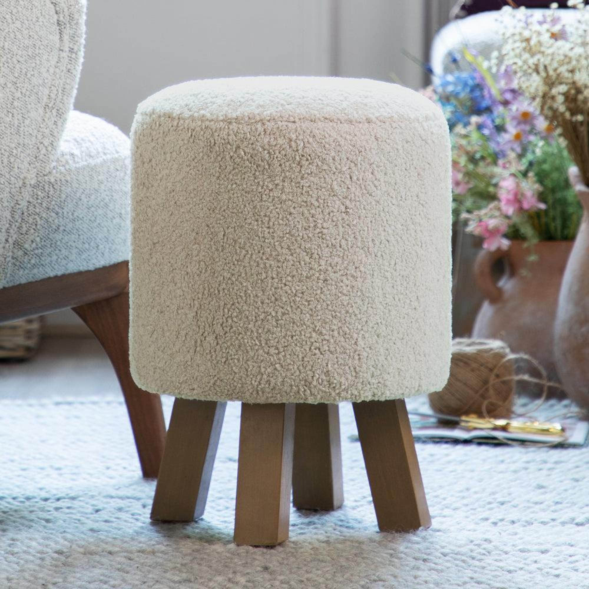 Product photograph of Voyage Maison Paddington Linen Monty Round Footstool from Choice Furniture Superstore.