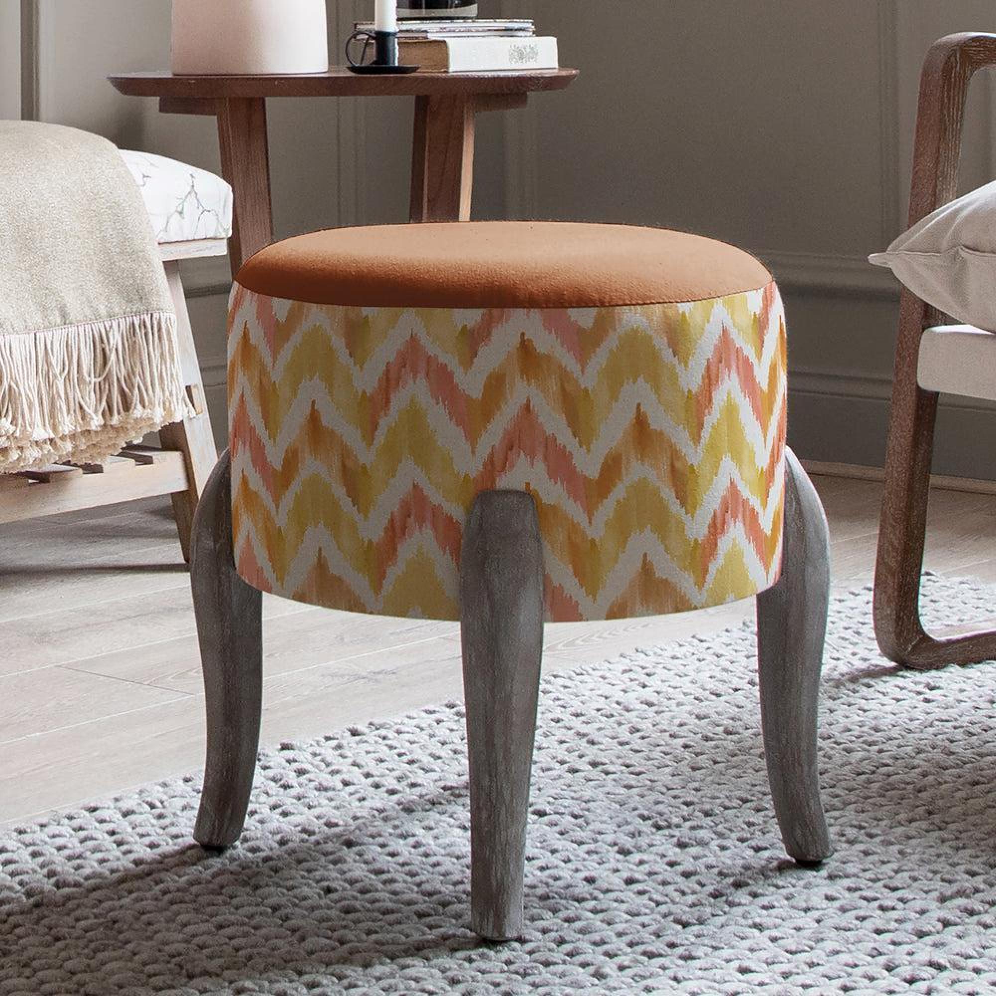 Product photograph of Voyage Maison Savannah Amber Printed Finn Footstool from Choice Furniture Superstore.