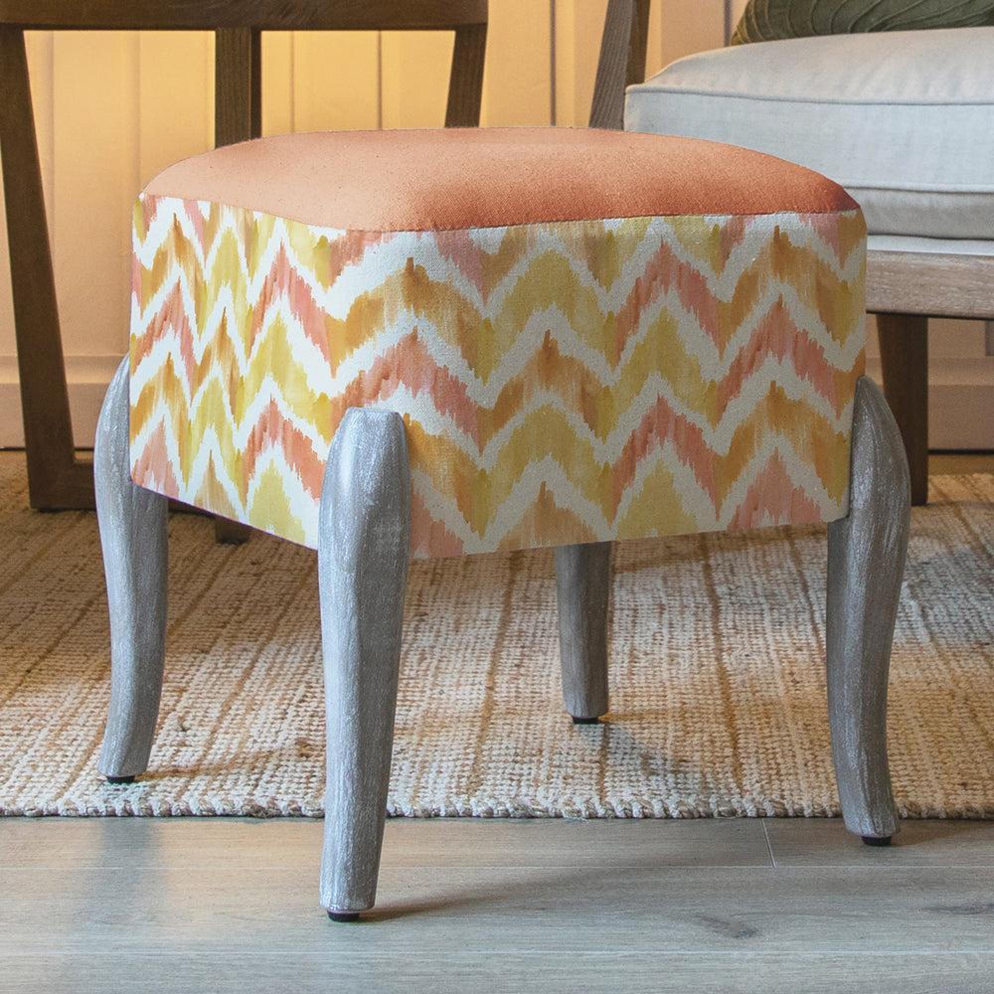 Product photograph of Voyage Maison Savannah Amber Printed Ralf Footstool from Choice Furniture Superstore.