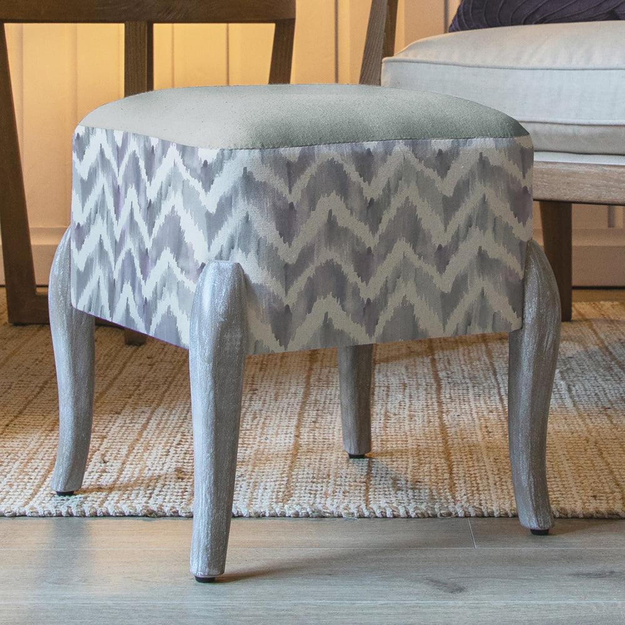 Product photograph of Voyage Maison Savannah Violet Printed Ralf Footstool from Choice Furniture Superstore.