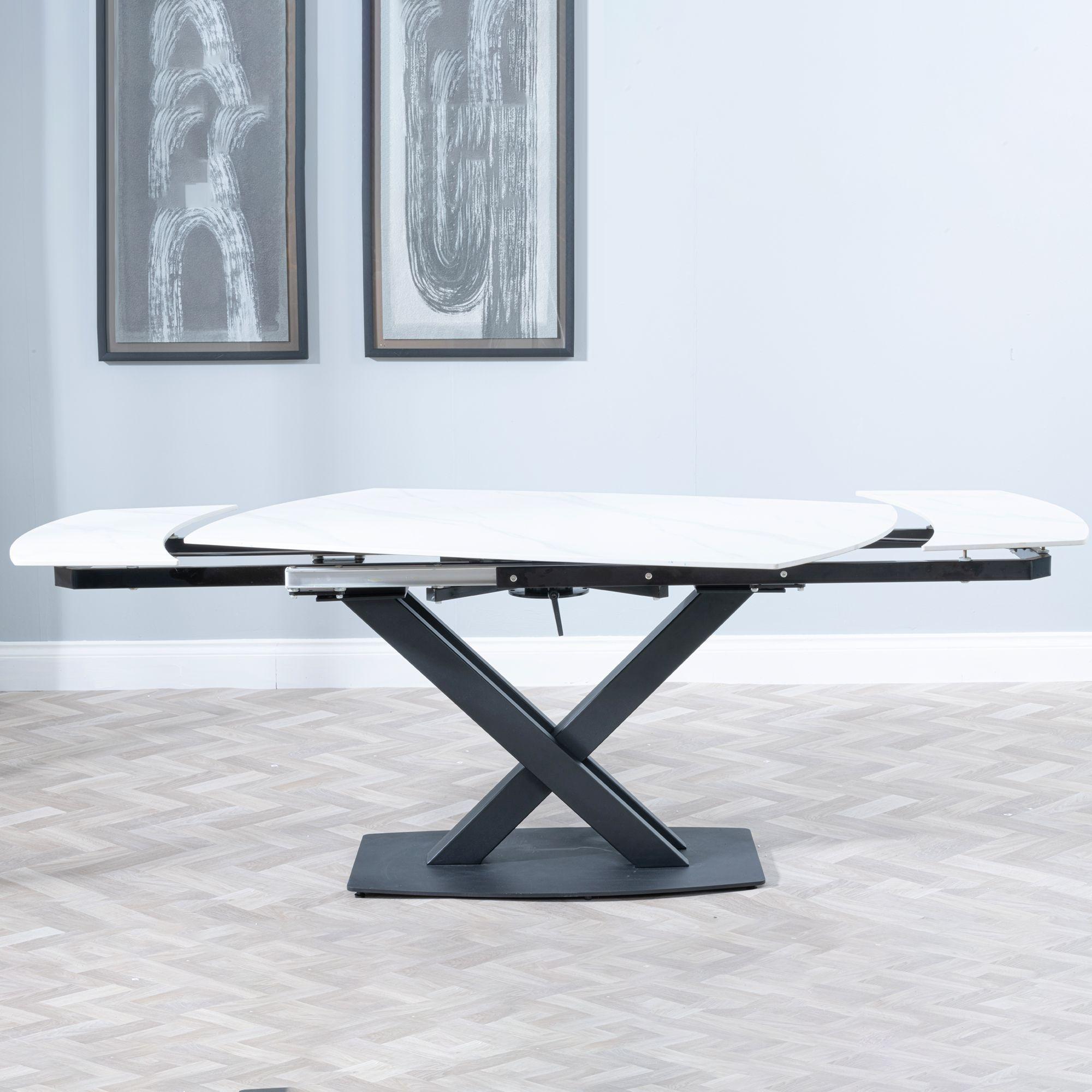 Product photograph of Arctic White Ceramic Swivel Top Extending Dining Table With Black Cross Base - 140cm-200cm from Choice Furniture Superstore.