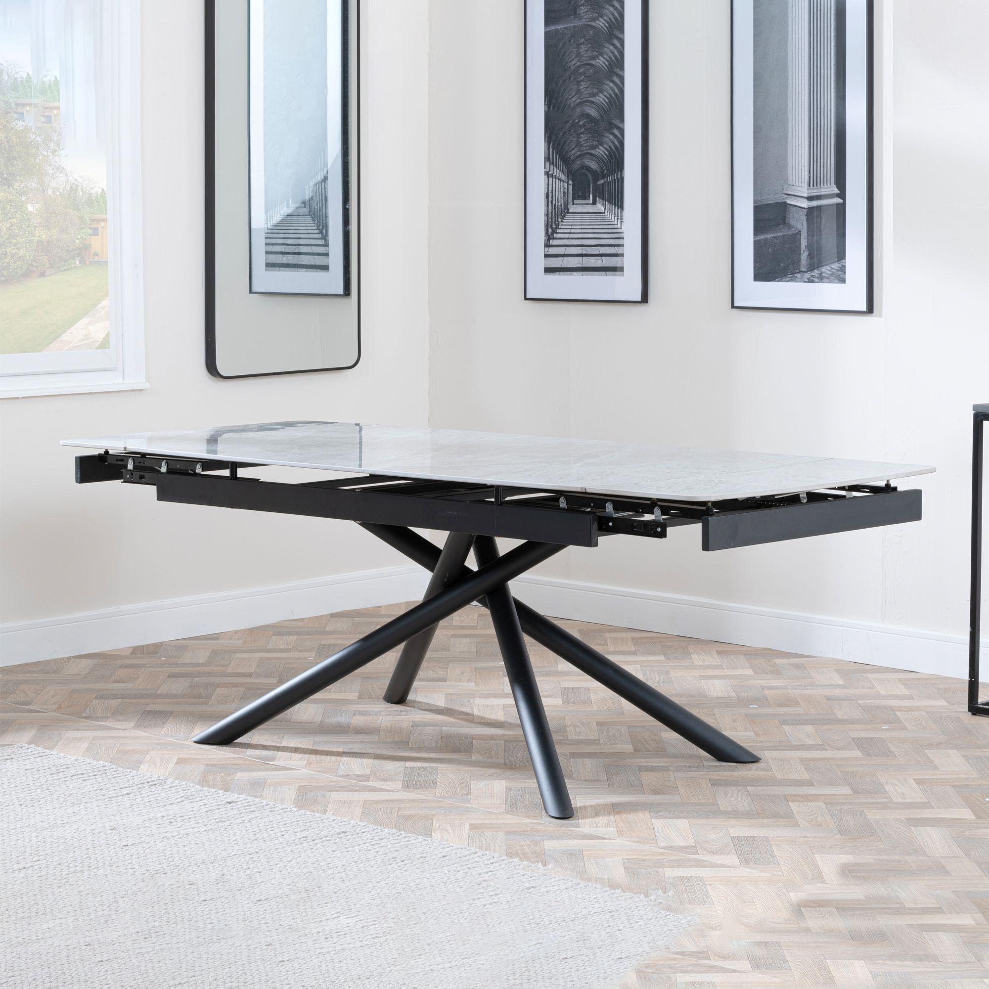 Product photograph of Apollo White Ceramic Extending Dining Table With Black Base - 160cm-220cm from Choice Furniture Superstore.