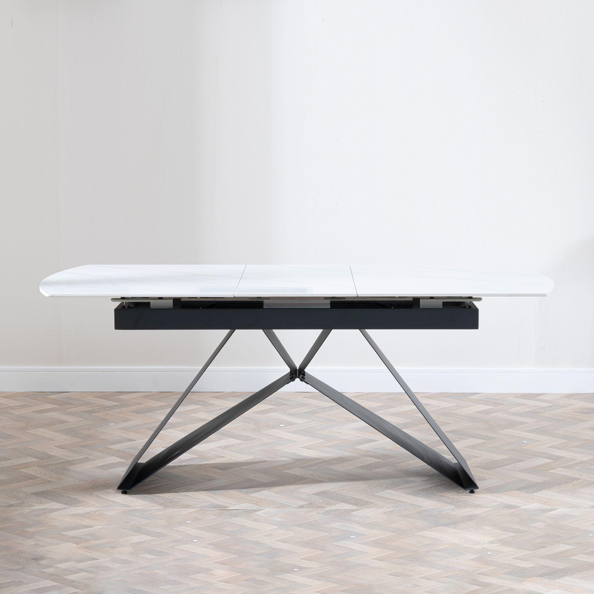 Product photograph of Westin White Ceramic Extending Dining Table With Black Cross Base - 140cm-180cm from Choice Furniture Superstore.