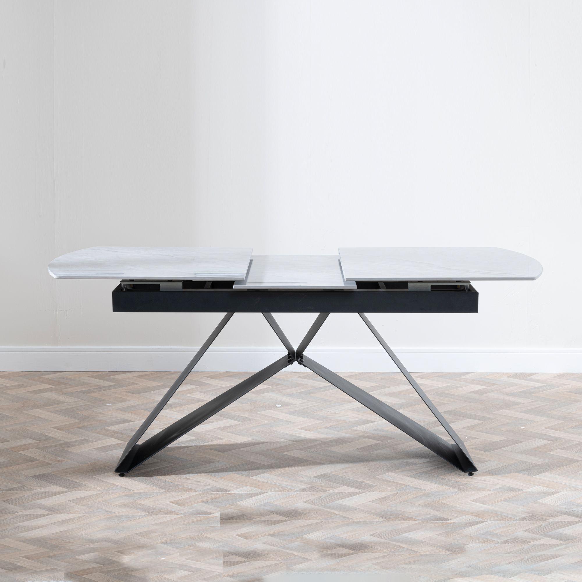 Product photograph of Westin Grey Ceramic Extending Dining Table With Black Cross Base - 140cm-180cm from Choice Furniture Superstore.