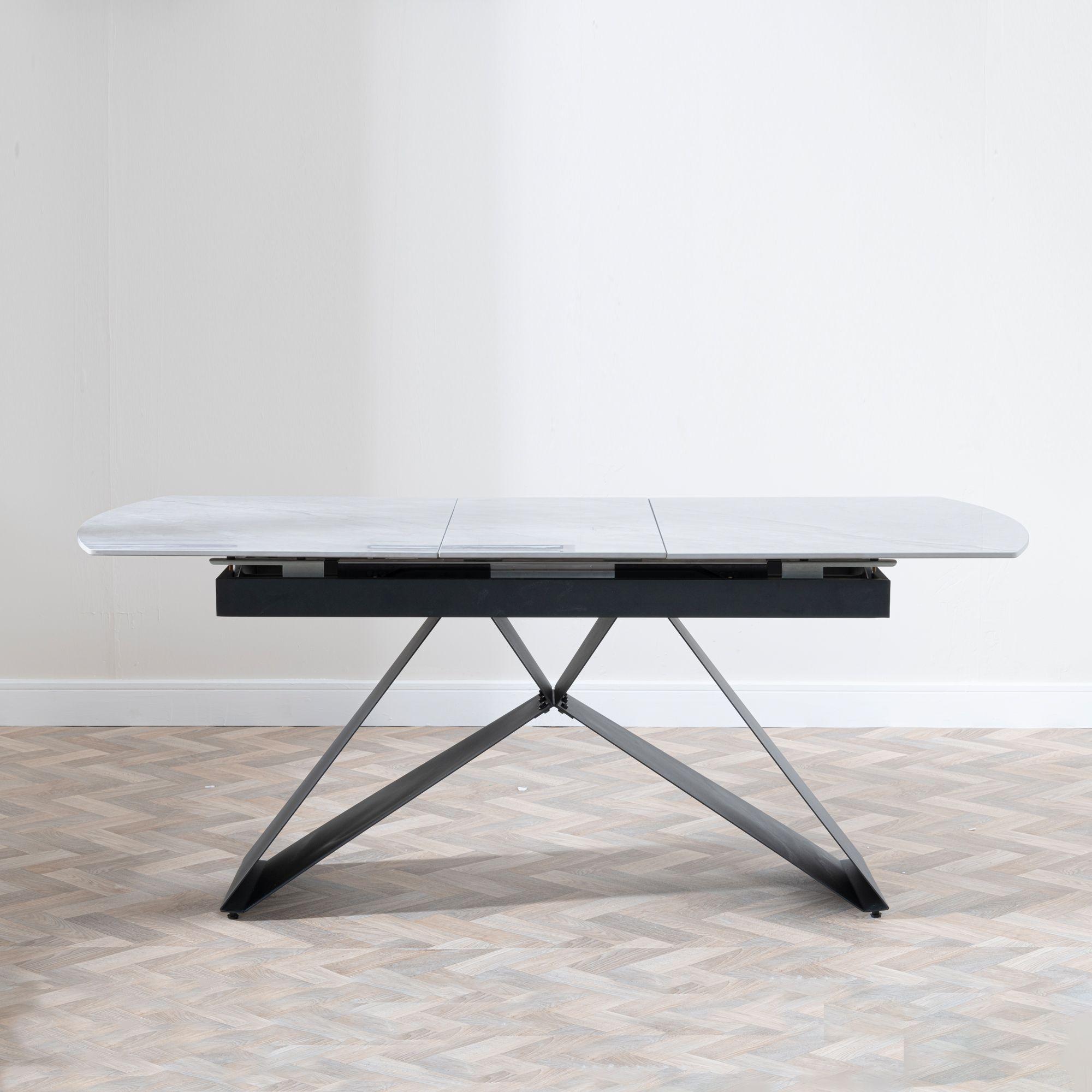 Product photograph of Westin Grey Ceramic Extending Dining Table With Black Cross Base - 140cm-180cm from Choice Furniture Superstore.