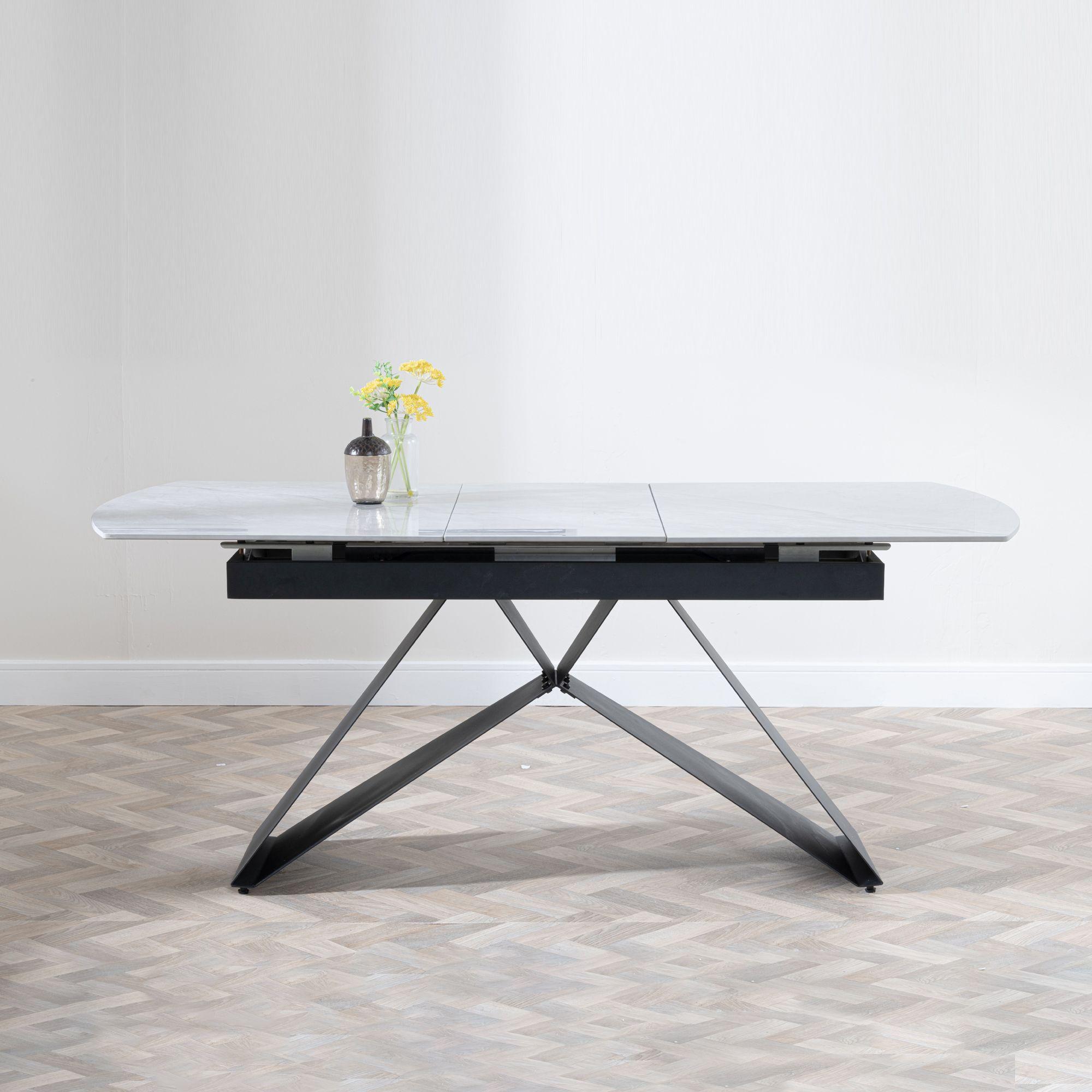 Product photograph of Westin Grey Ceramic Extending Dining Table With Black Cross Base - 140cm-180cm from Choice Furniture Superstore.