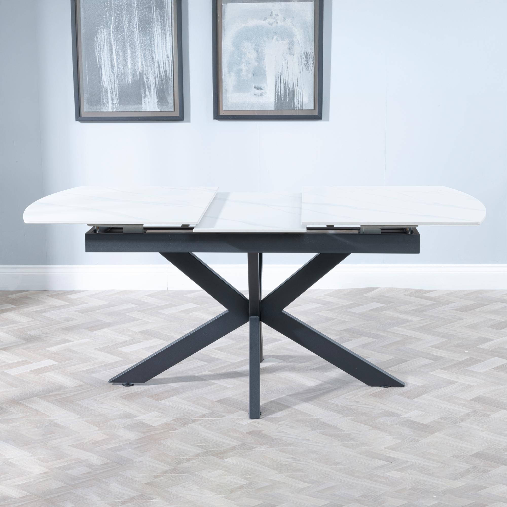 Product photograph of Bari White Ceramic Extending Dining Table With Black Star Base - 140cm-180cm from Choice Furniture Superstore.