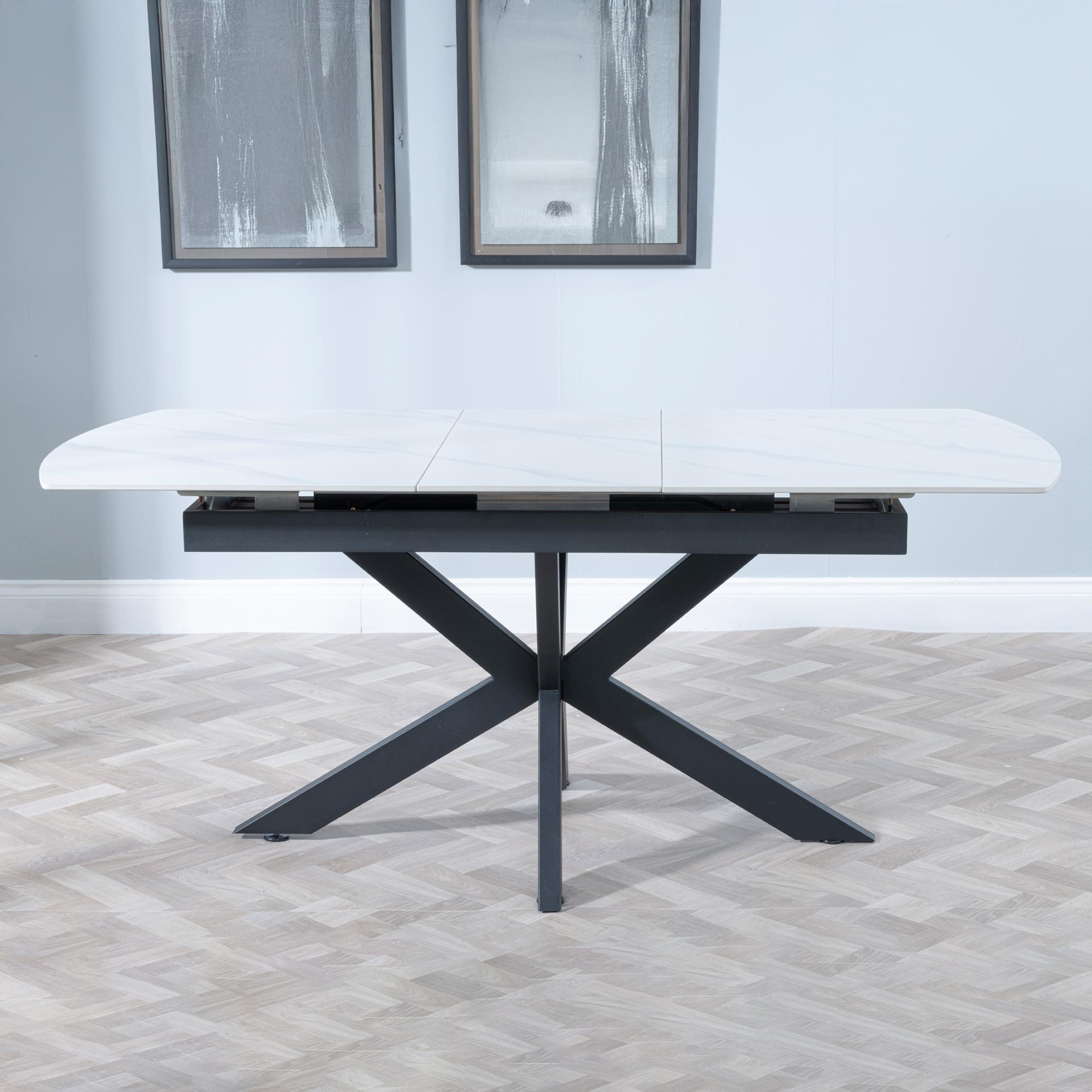 Product photograph of Bari White Ceramic Extending Dining Table With Black Star Base - 140cm-180cm from Choice Furniture Superstore.