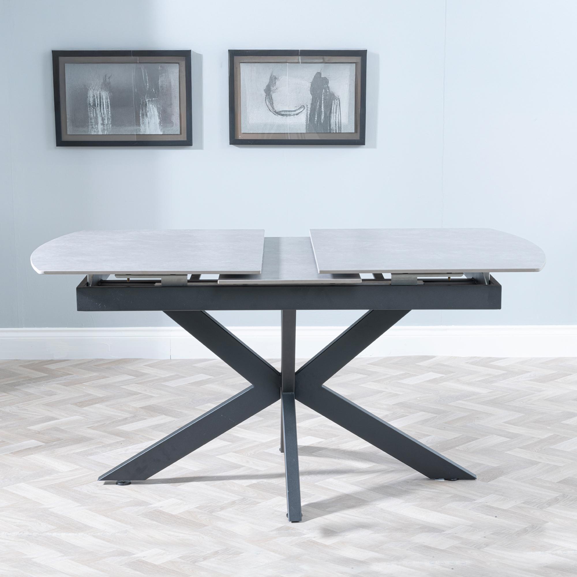 Product photograph of Bari Grey Ceramic Extending Dining Table With Black Star Base - 140cm-180cm from Choice Furniture Superstore.