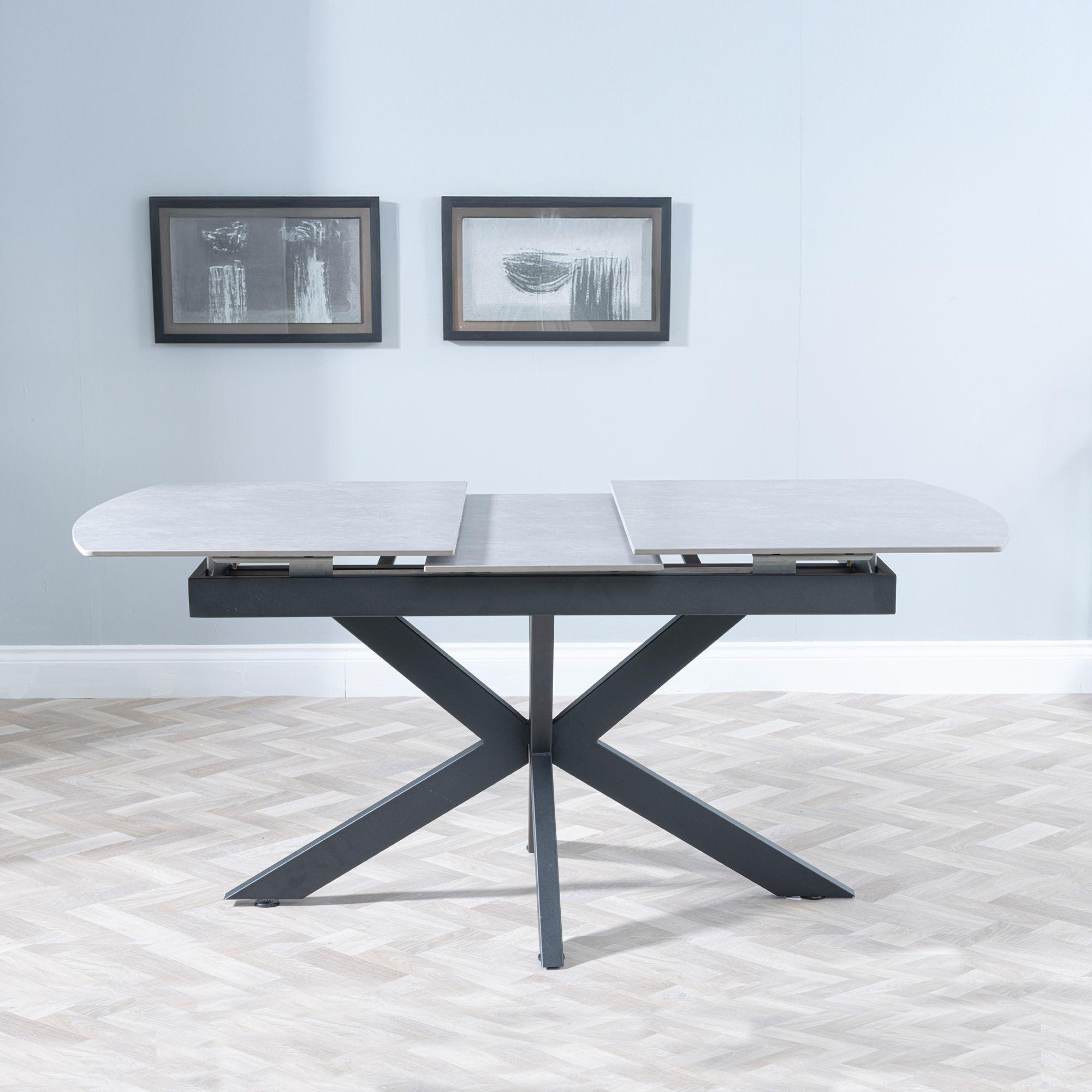 Product photograph of Bari Grey Ceramic Extending Dining Table With Black Star Base - 140cm-180cm from Choice Furniture Superstore.