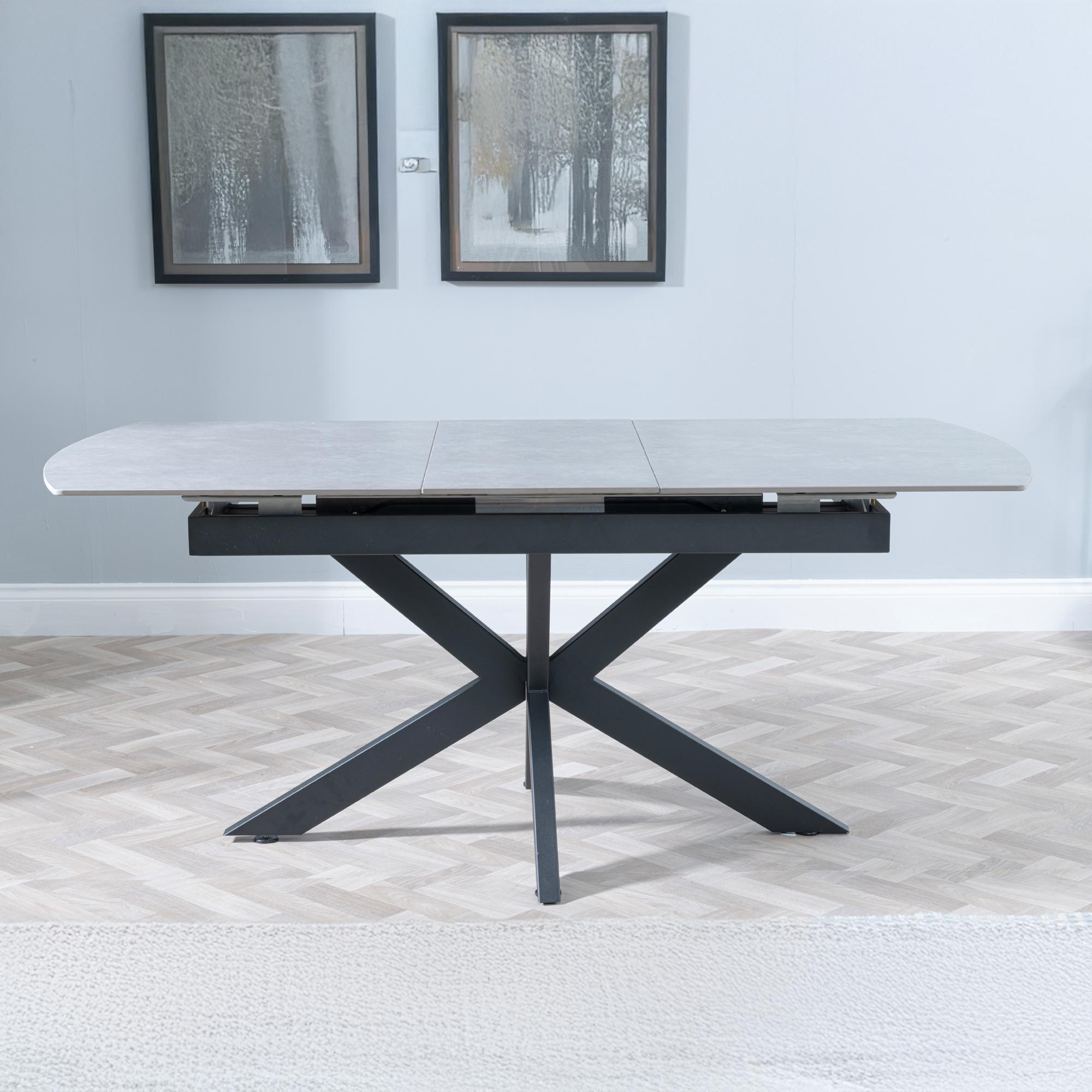 Product photograph of Bari Grey Ceramic Extending Dining Table With Black Star Base - 140cm-180cm from Choice Furniture Superstore.