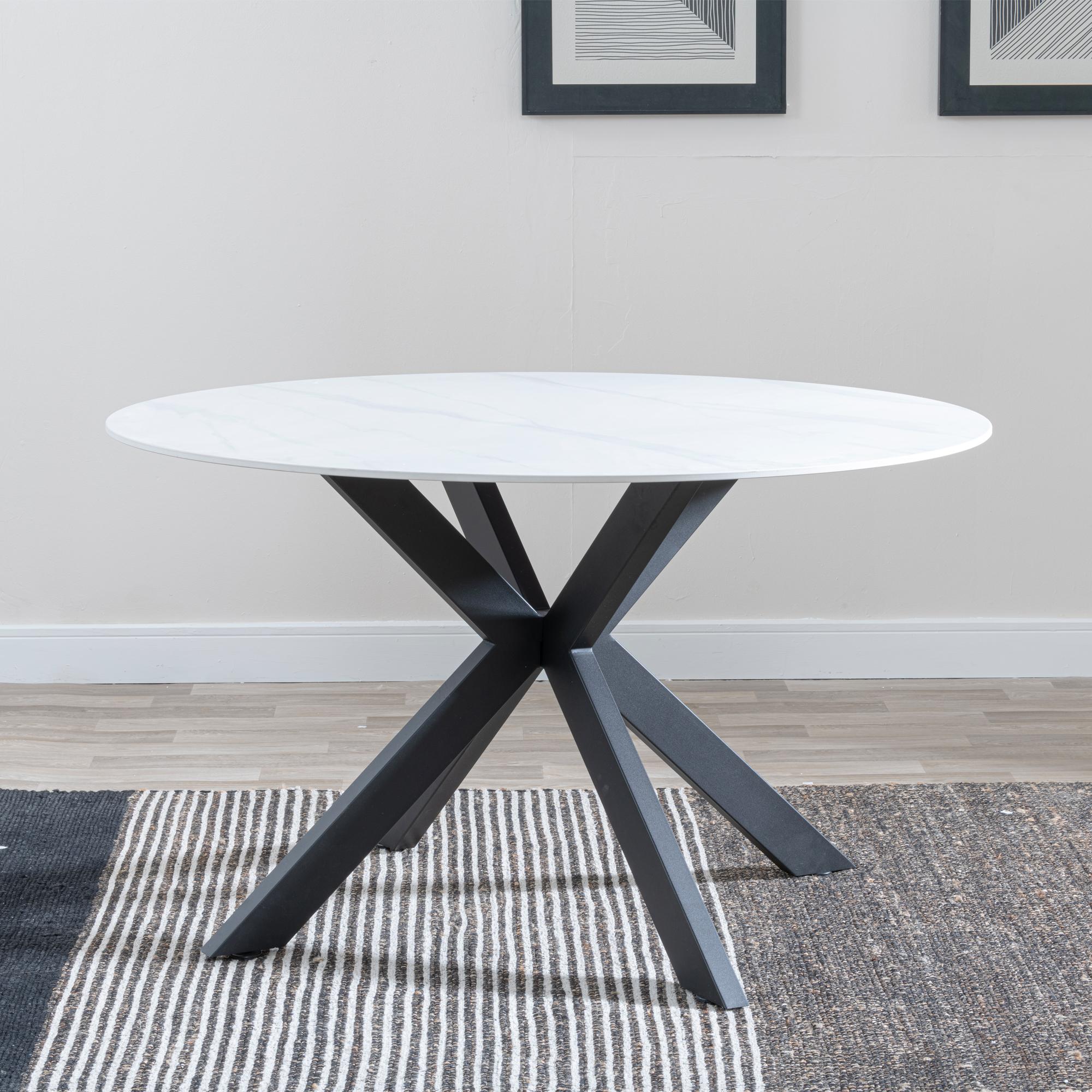 Product photograph of Novara 130cm White Ceramic Round Dining Table With Black Star Base from Choice Furniture Superstore.