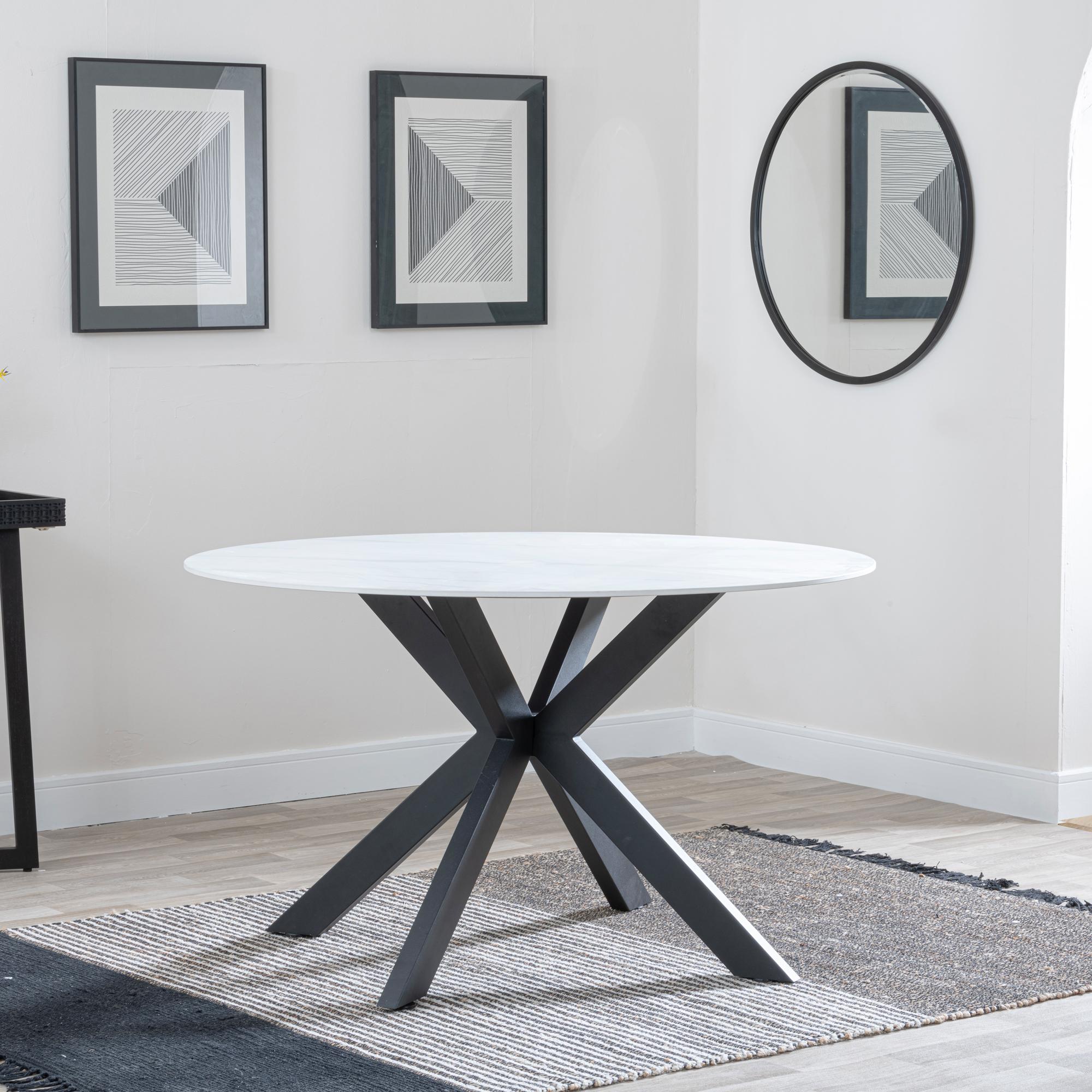 Product photograph of Novara 130cm White Ceramic Round Dining Table With Black Star Base from Choice Furniture Superstore.