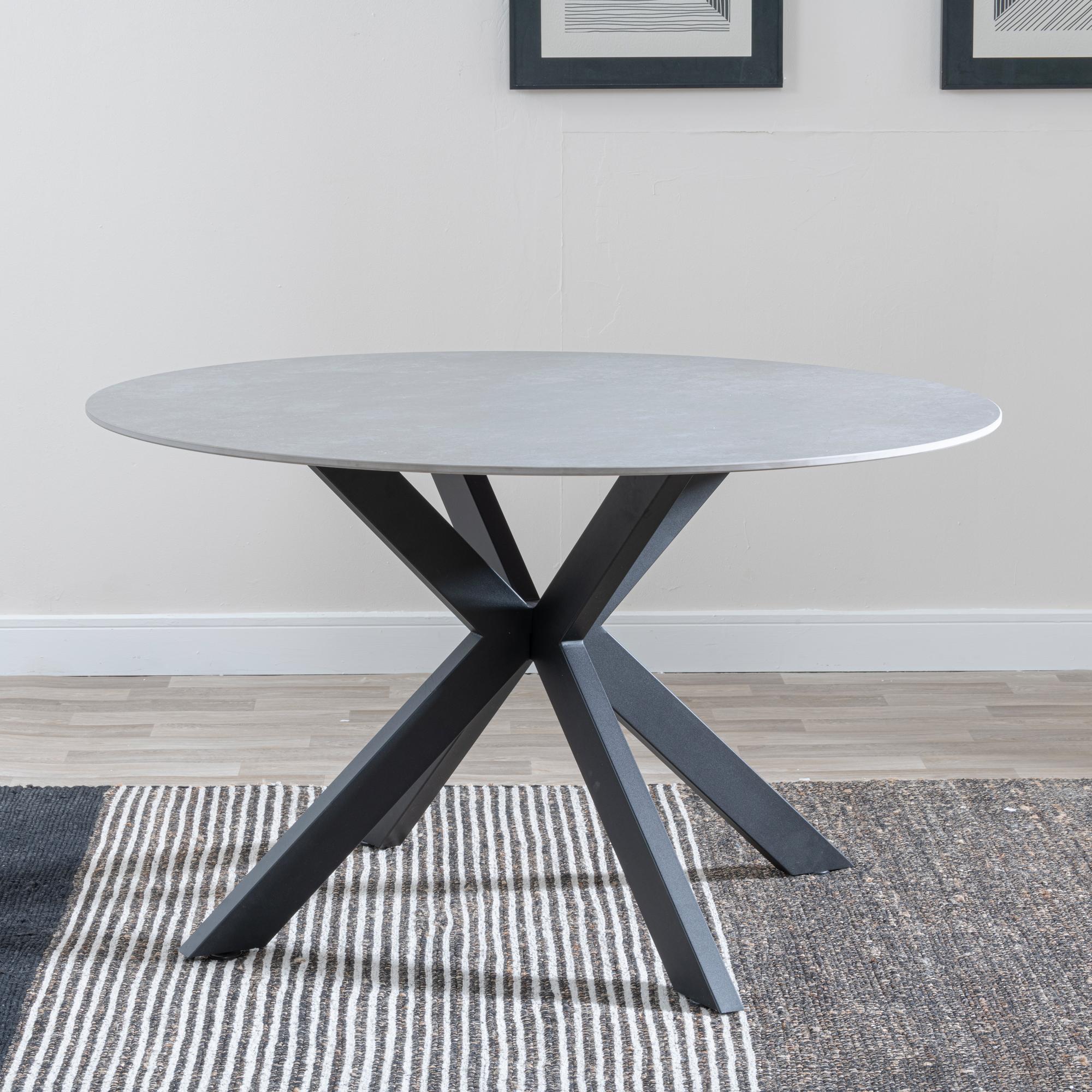 Product photograph of Novara 130cm Grey Ceramic Round Dining Table With Black Star Base from Choice Furniture Superstore.