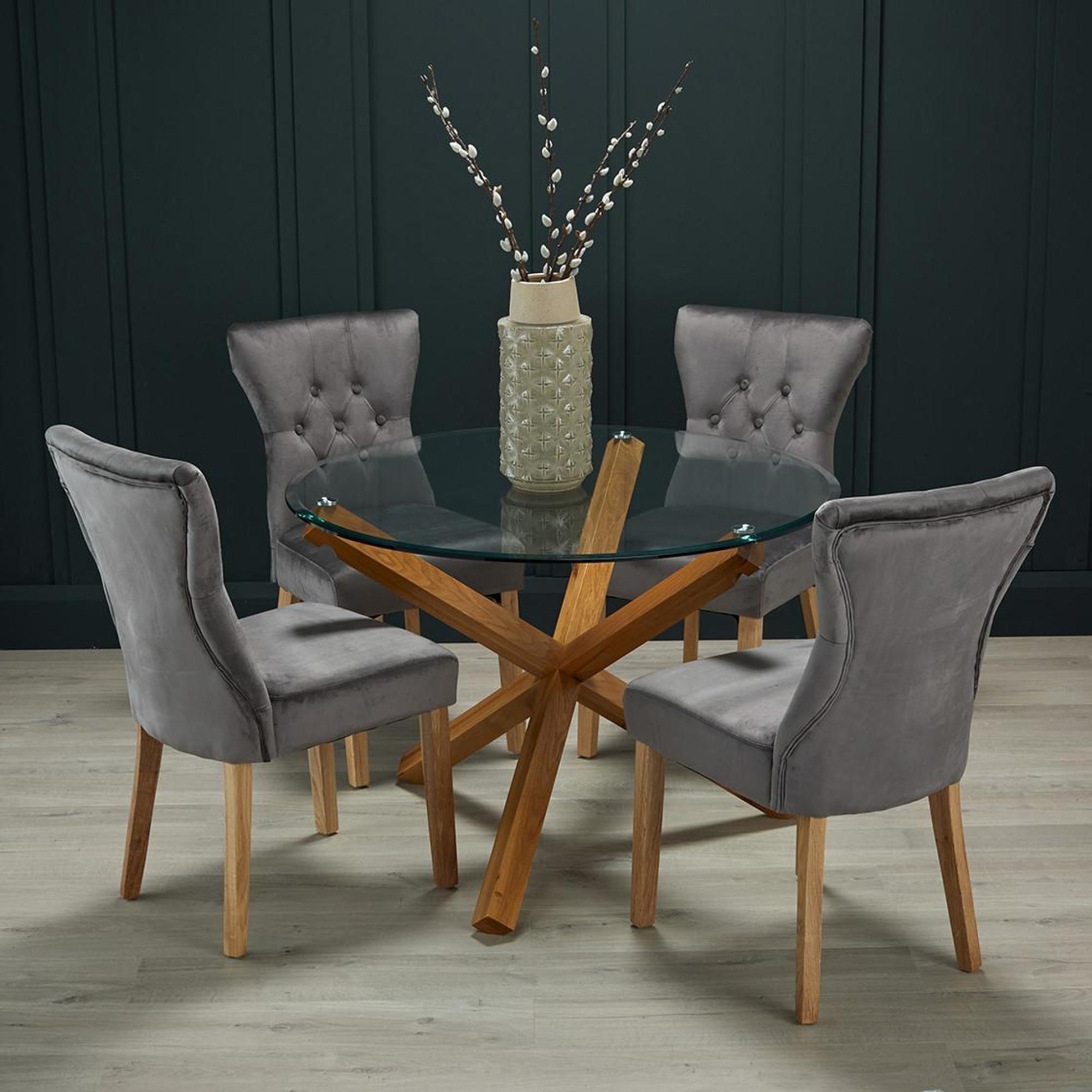 Product photograph of Oporto Solid Oak And Glass Dining Table from Choice Furniture Superstore.