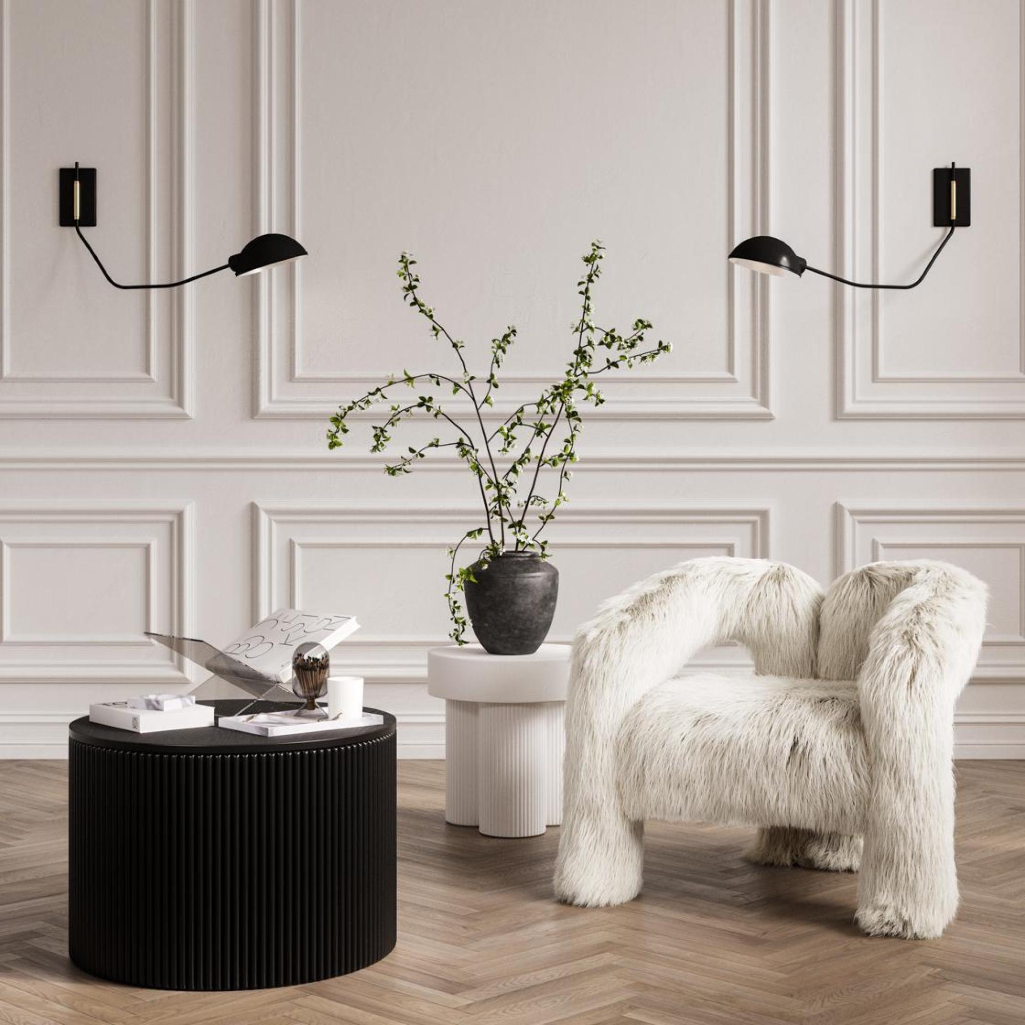 Product photograph of Eden Black Fluted Round Coffee Table from Choice Furniture Superstore.