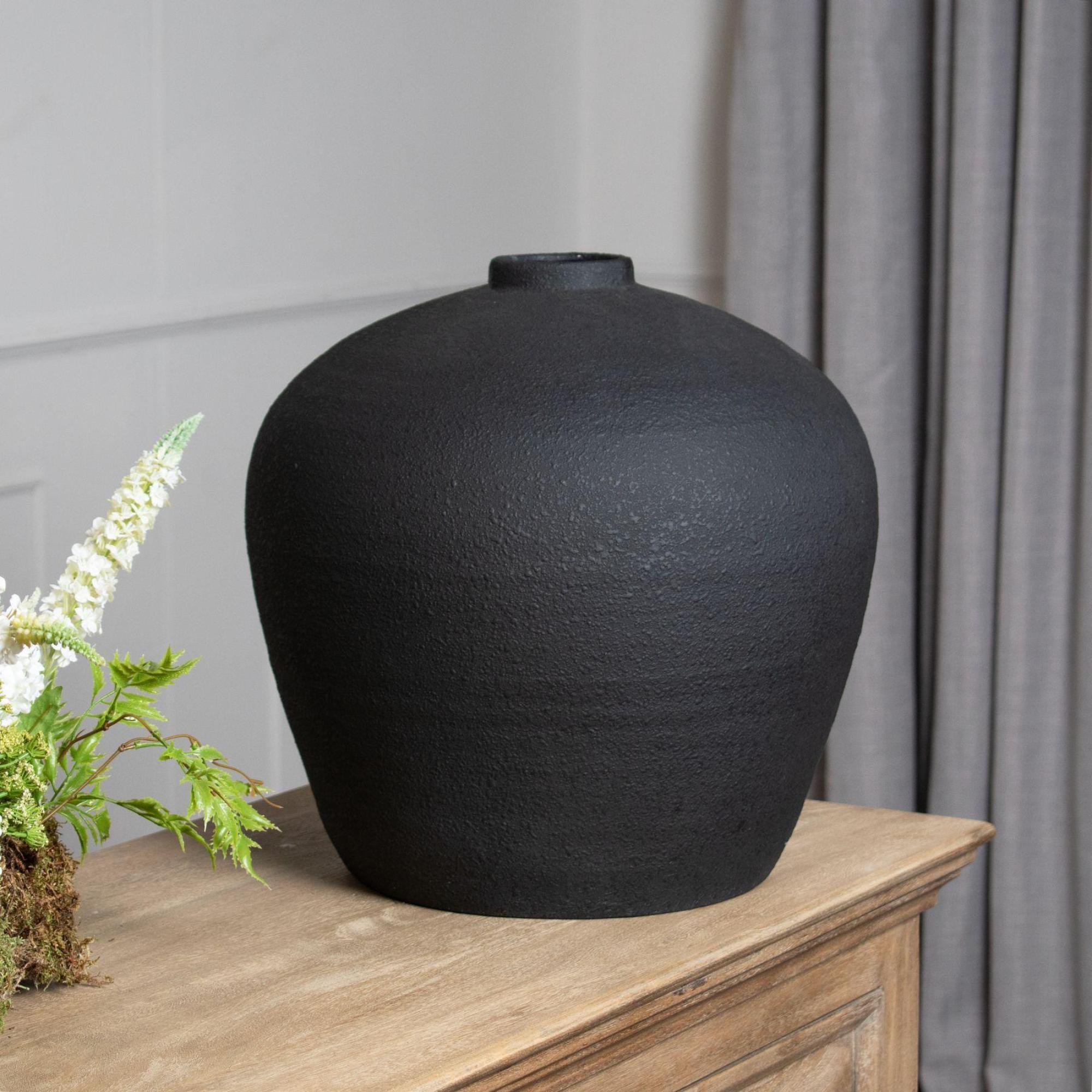 Product photograph of Matt Black Ceramic Astral Vase from Choice Furniture Superstore.
