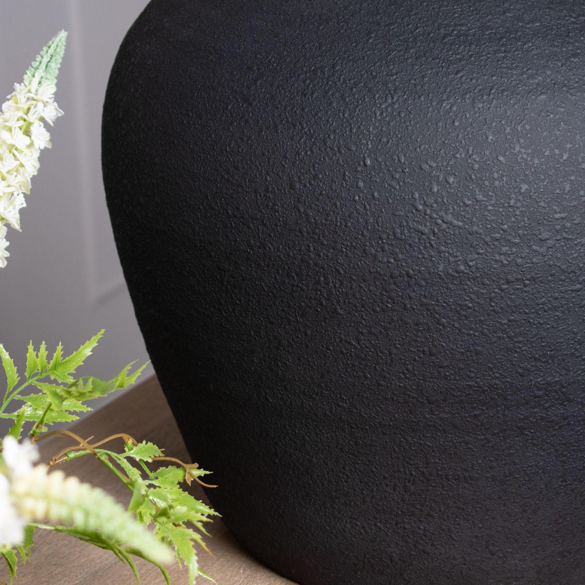 Product photograph of Matt Black Ceramic Astral Vase from Choice Furniture Superstore.
