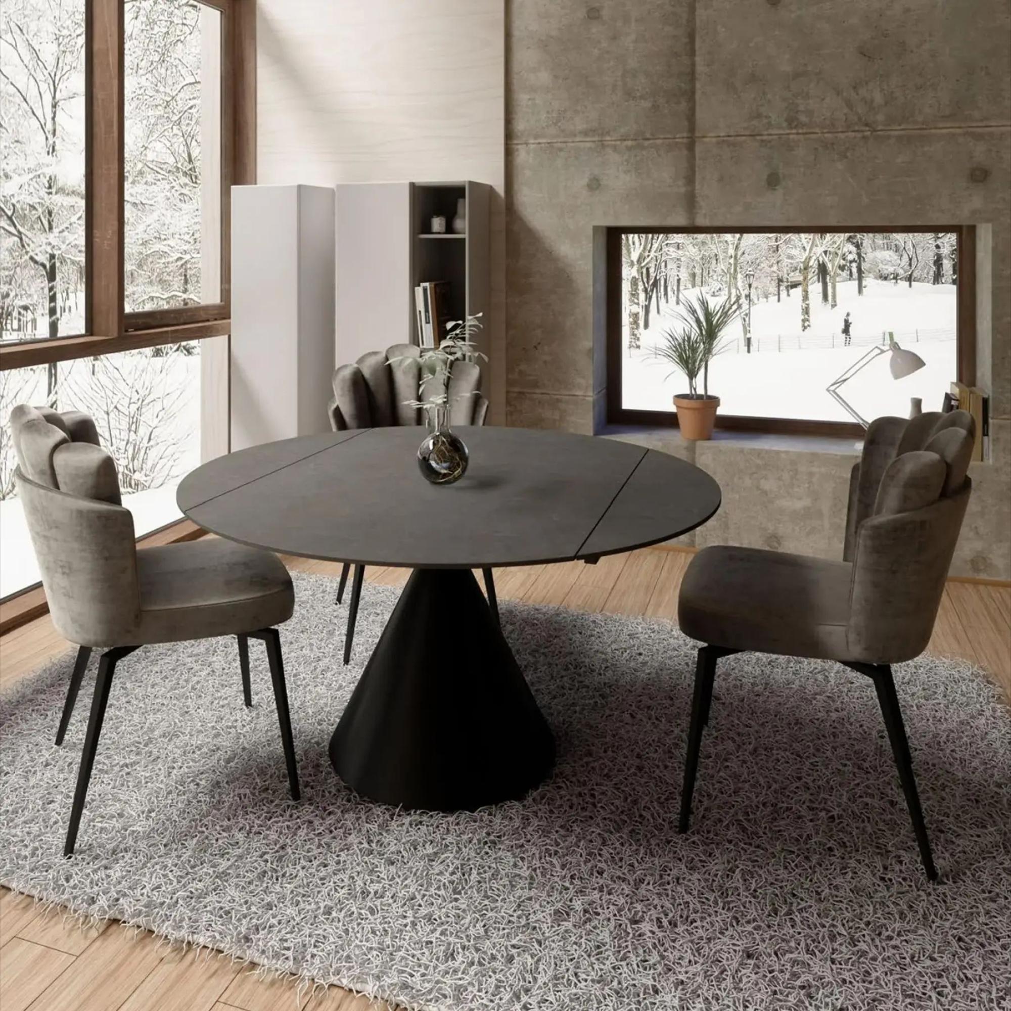 Product photograph of Alonso Grey Ceramic Round Swivel Extending Dining Table - 85cm-135cm from Choice Furniture Superstore.