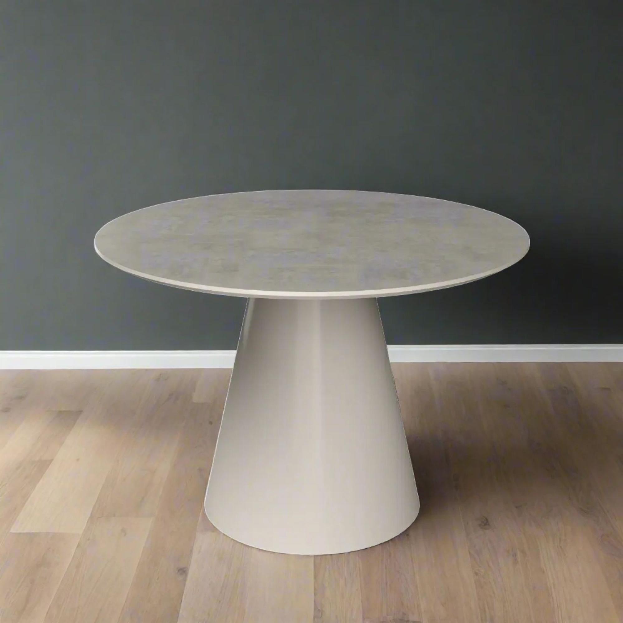 Product photograph of Simoni Grey Concrete Effect Top 4 Seater Round Dining Table With Cone Base from Choice Furniture Superstore.