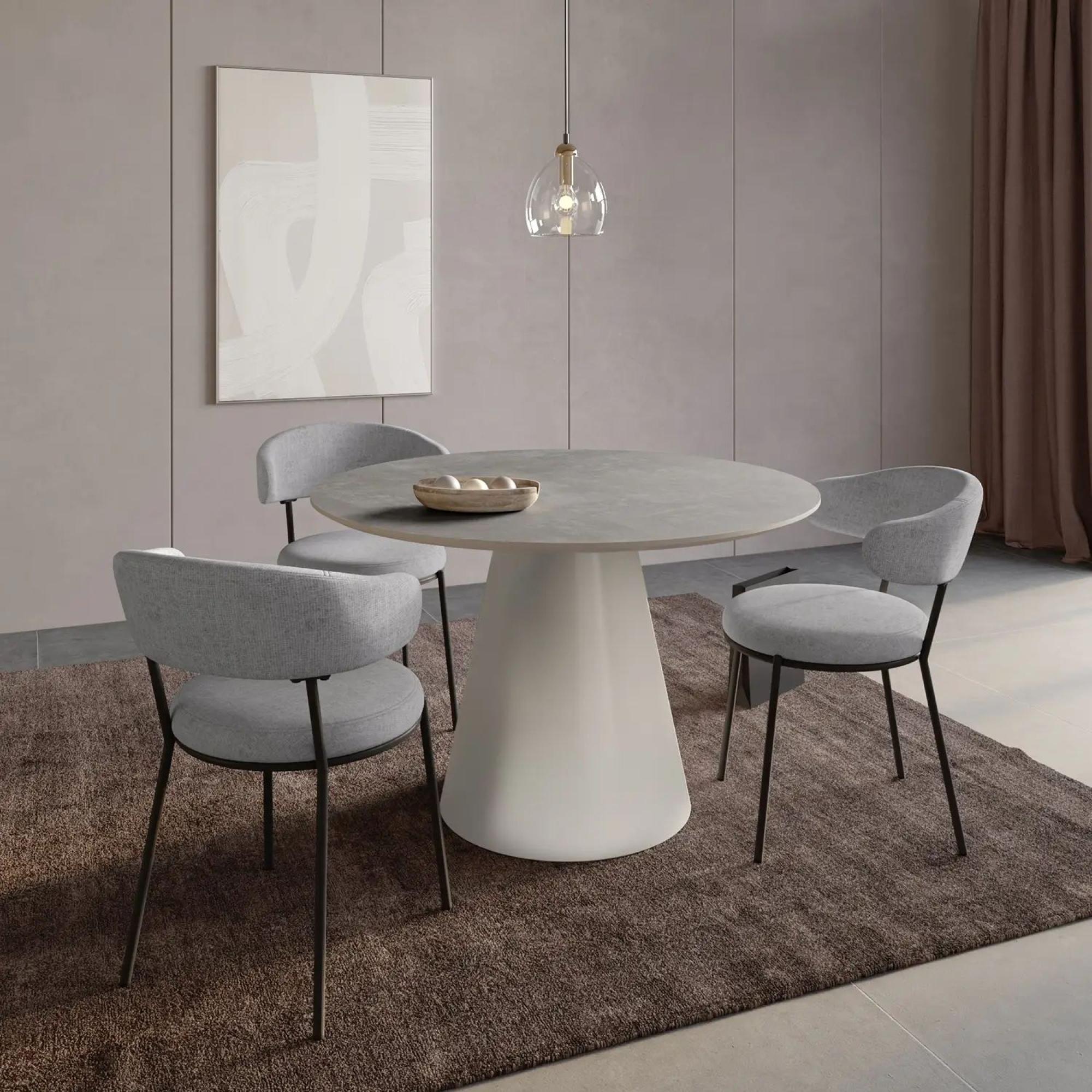 Product photograph of Simoni Grey Concrete Effect Top 4 Seater Round Dining Table With Cone Base from Choice Furniture Superstore.