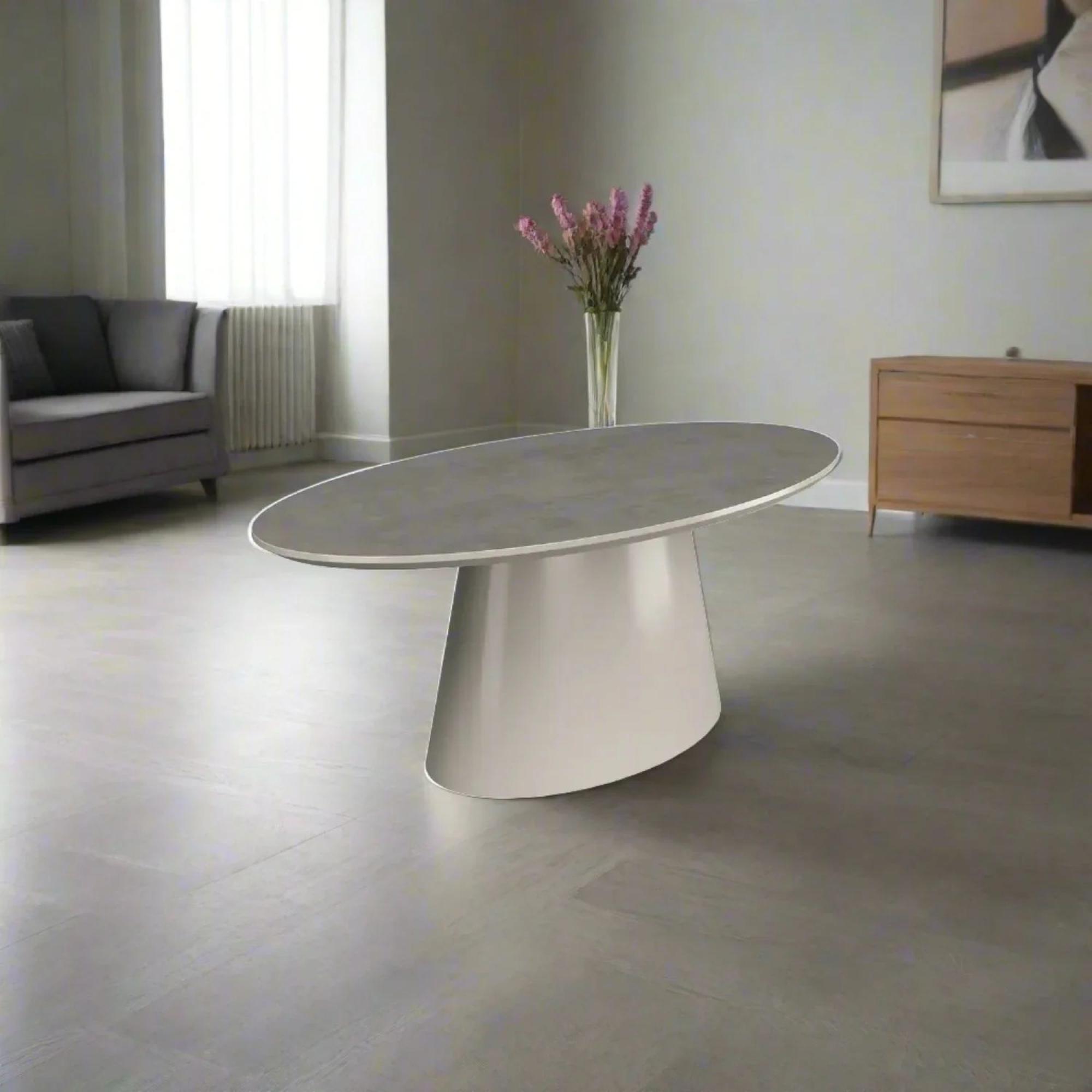 Product photograph of Simoni Grey Concrete Effect Top 6 Seater Oval Dining Table With Cone Base from Choice Furniture Superstore.