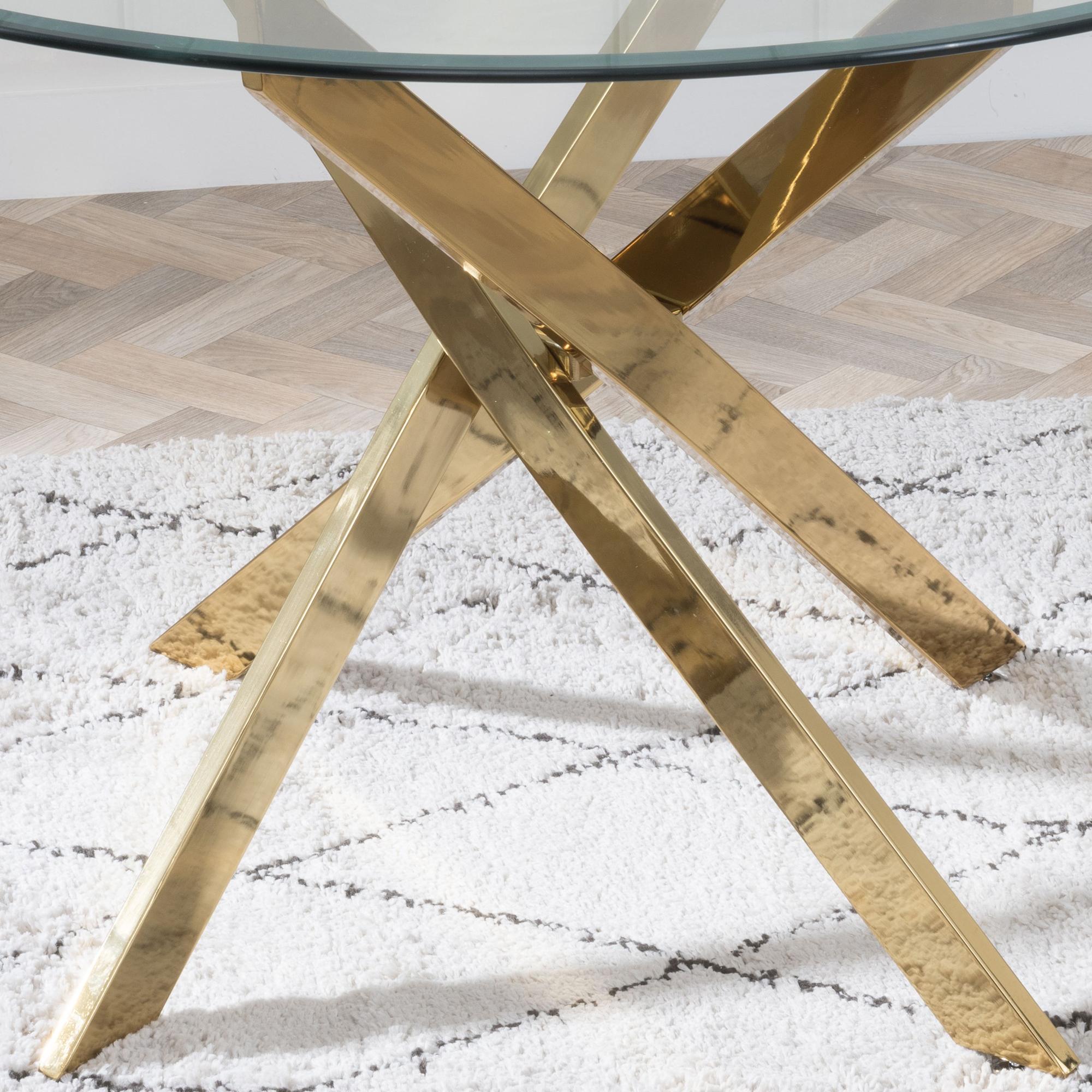 Product photograph of Chopstick Clear Glass 4 Seater Round Dining Table With Gold Metal Chopstick Legs from Choice Furniture Superstore.