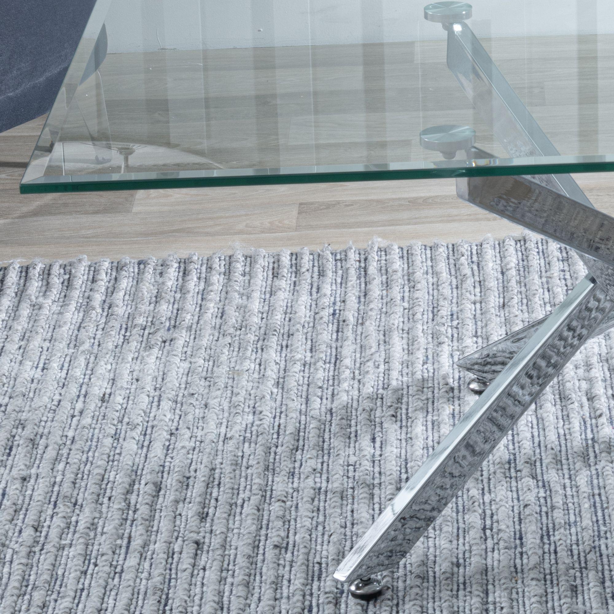 Product photograph of Chopstick Clear Glass Coffee Table With Chrome Metal Chopstick Legs from Choice Furniture Superstore.