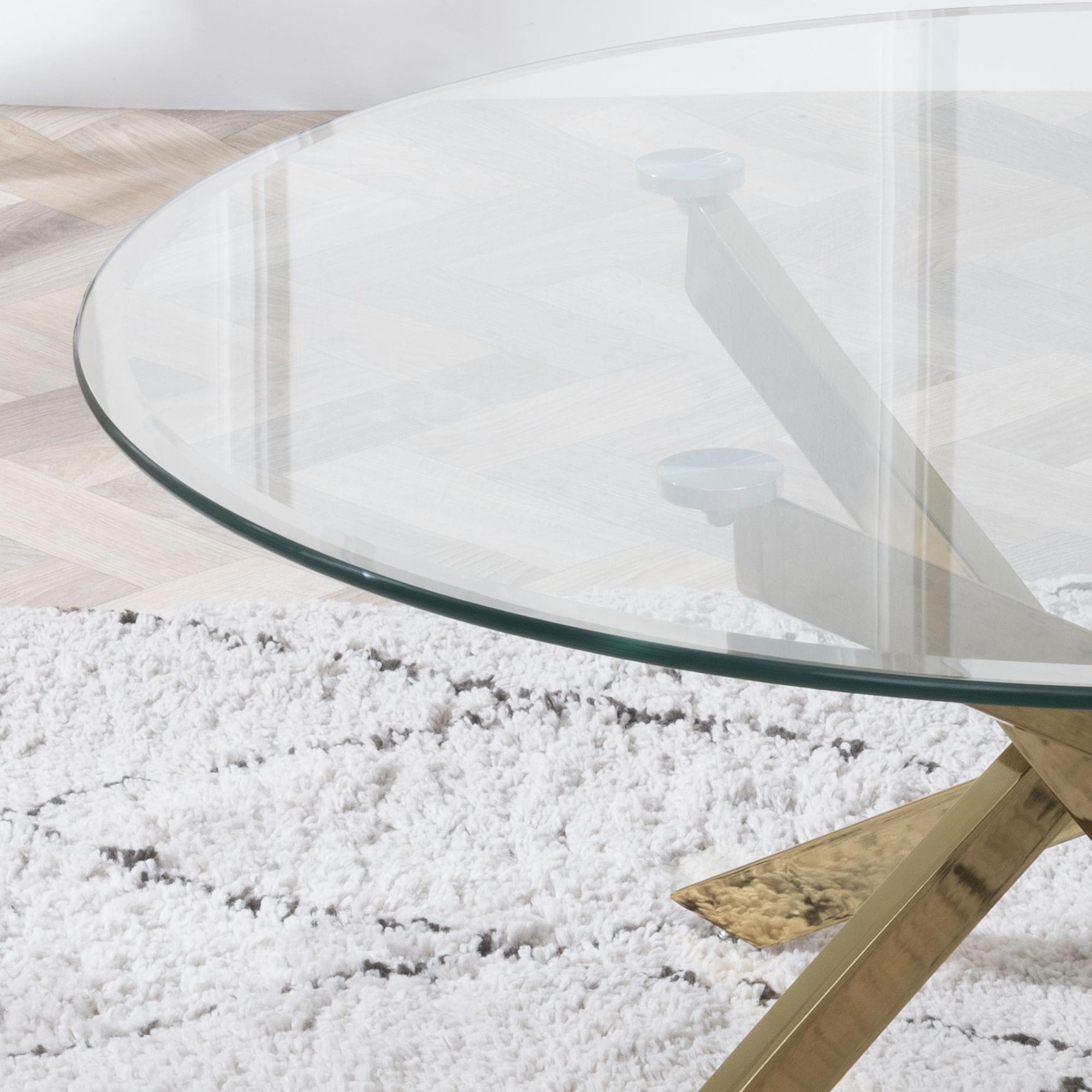 Product photograph of Chopstick Clear Glass Round Coffee Table With Gold Metal Chopstick Legs from Choice Furniture Superstore.