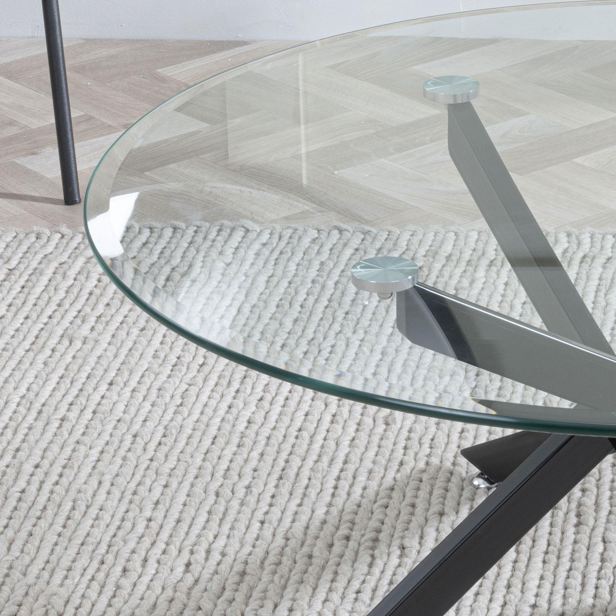 Product photograph of Chopstick Clear Glass Round Coffee Table With Black Metal Chopstick Legs from Choice Furniture Superstore.