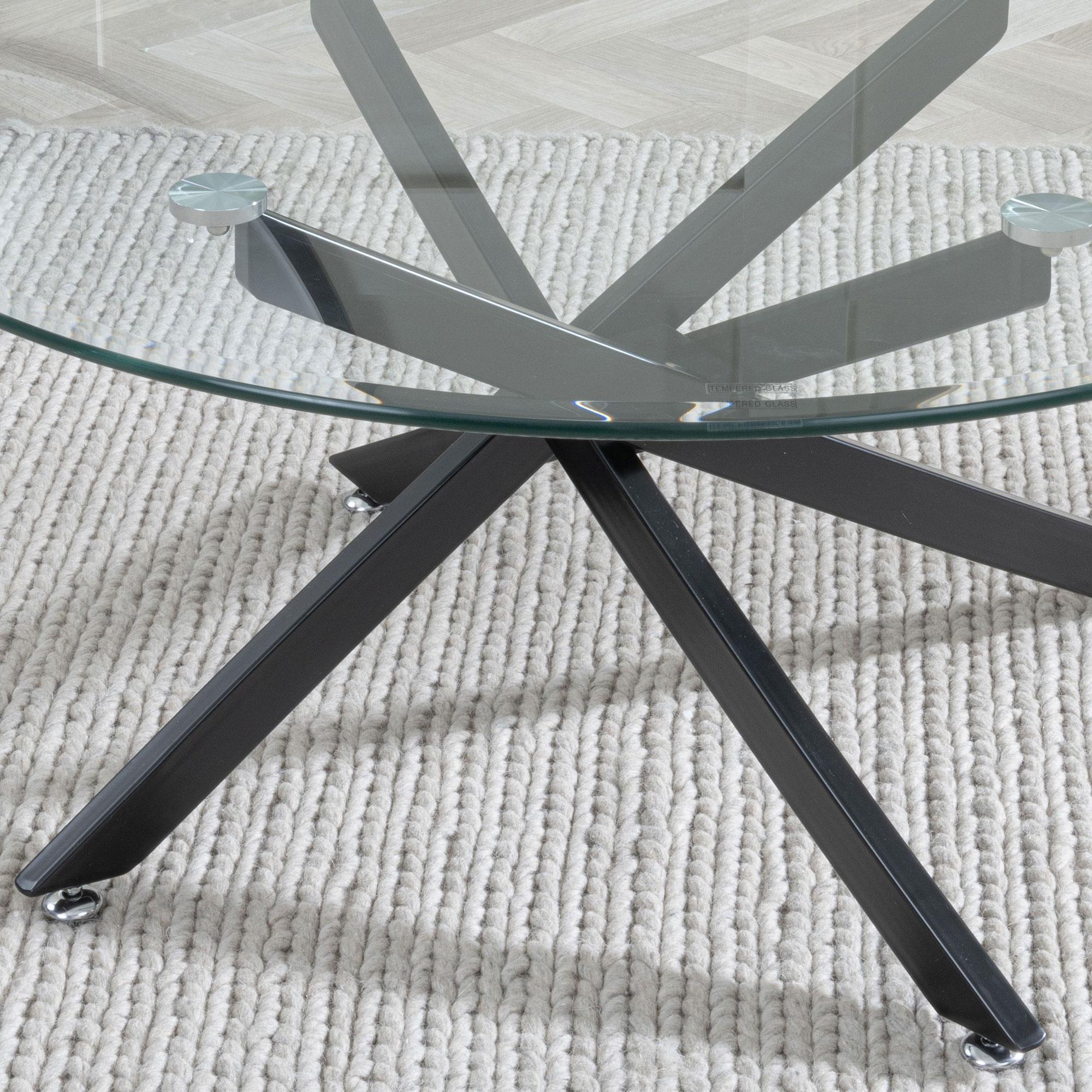 Product photograph of Chopstick Clear Glass Round Coffee Table With Black Metal Chopstick Legs from Choice Furniture Superstore.