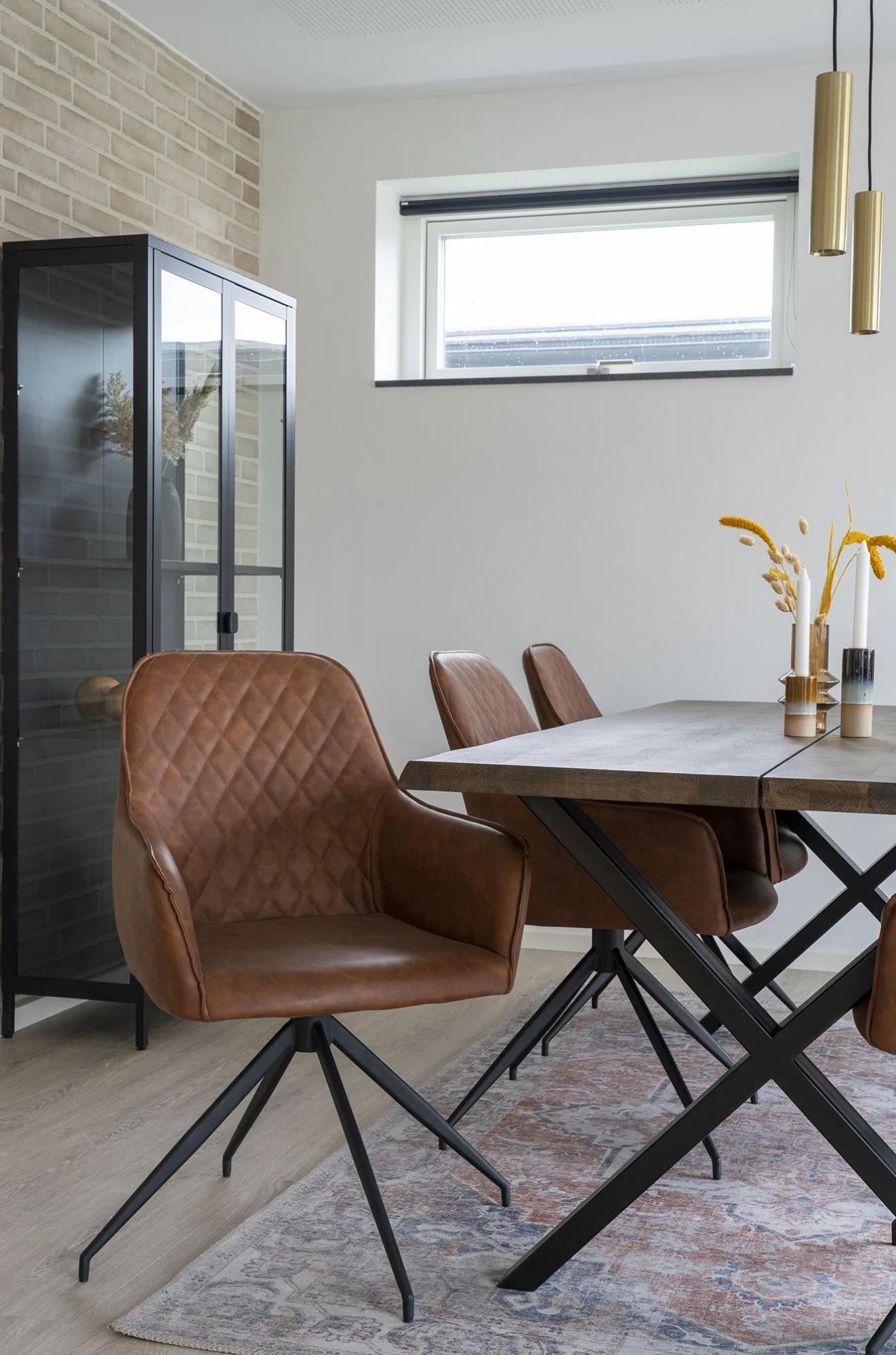 Product photograph of 2 X Vance Brown Leather Swivel Dining Chair With Black Legs from Choice Furniture Superstore.