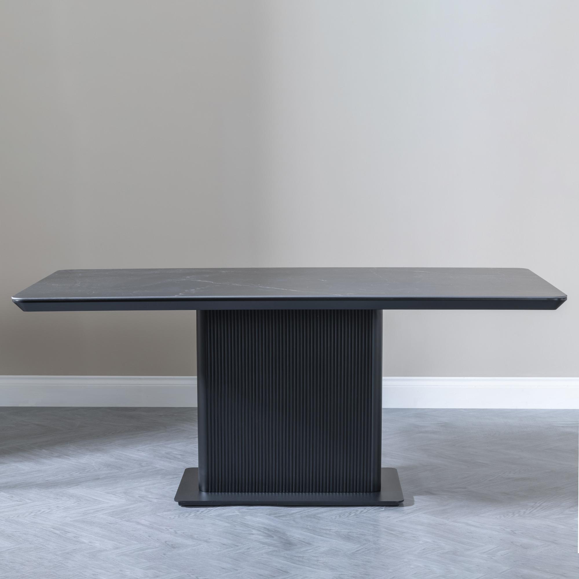 Product photograph of Morgan 6 Seater Black Ceramic Fluted Dining Table from Choice Furniture Superstore.