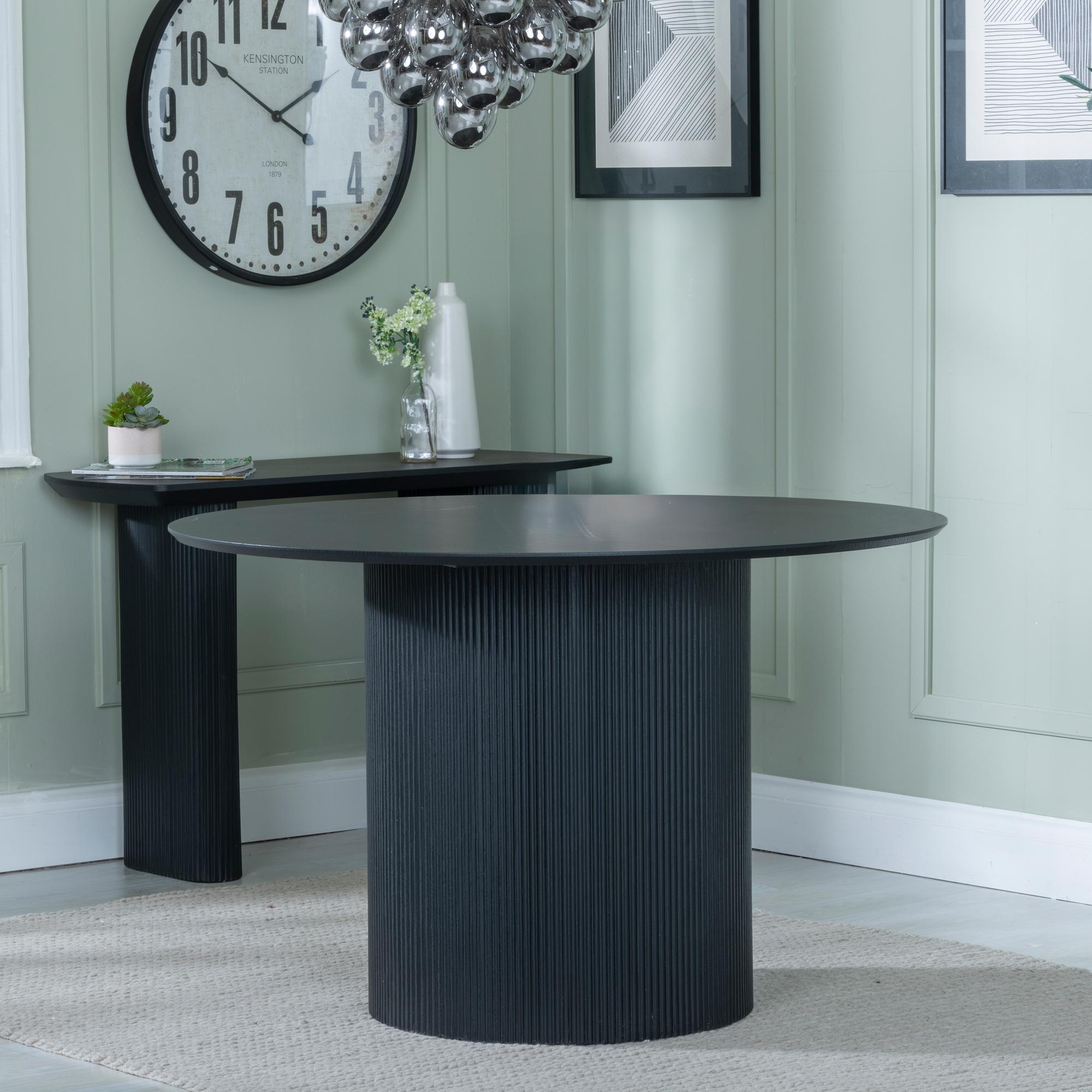 Product photograph of Bern Fluted 4 Seater Black Round Dining Table With Drum Base - 120cm from Choice Furniture Superstore.