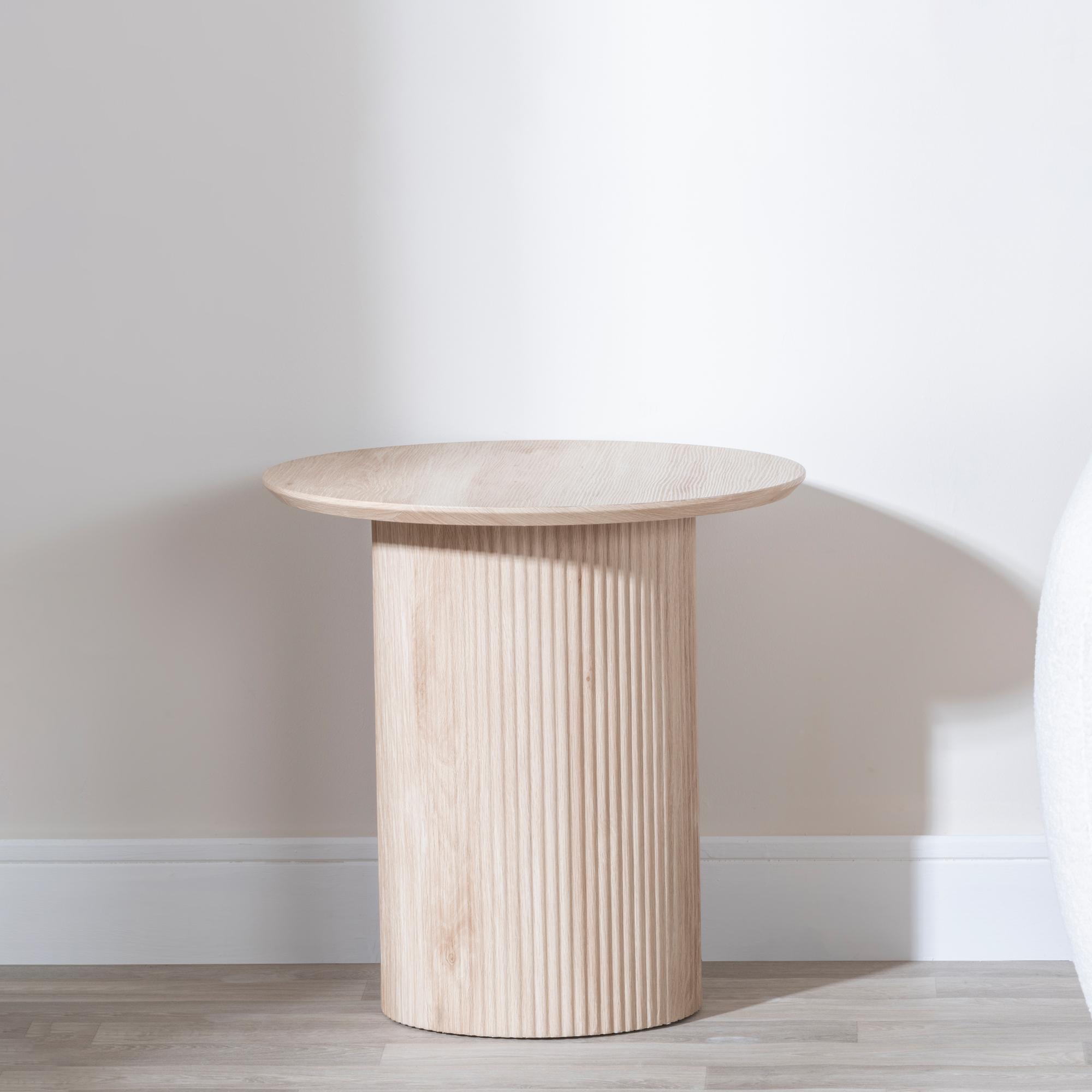 Product photograph of Bern Fluted Oak Effect Round End Table With Drum Base from Choice Furniture Superstore.
