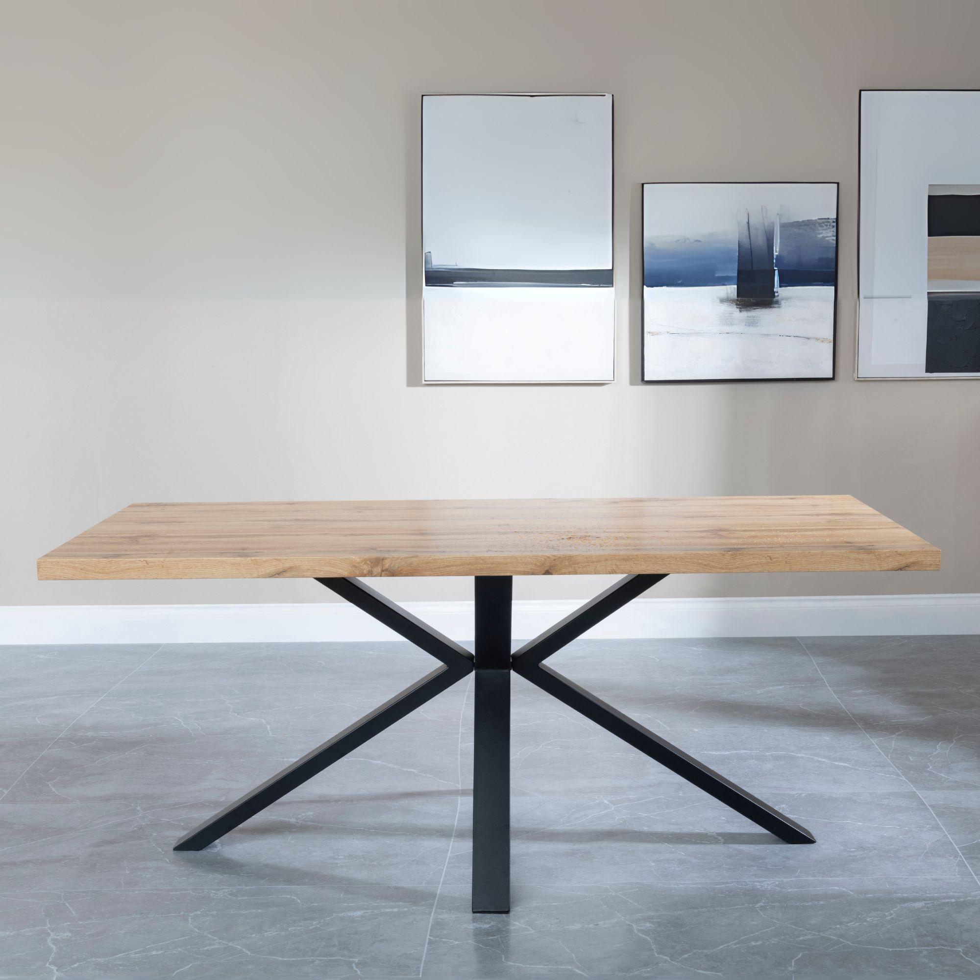 Product photograph of Bronx Industrial Oak Effect 6 Seater Dining Table With Black Spider Legs from Choice Furniture Superstore.