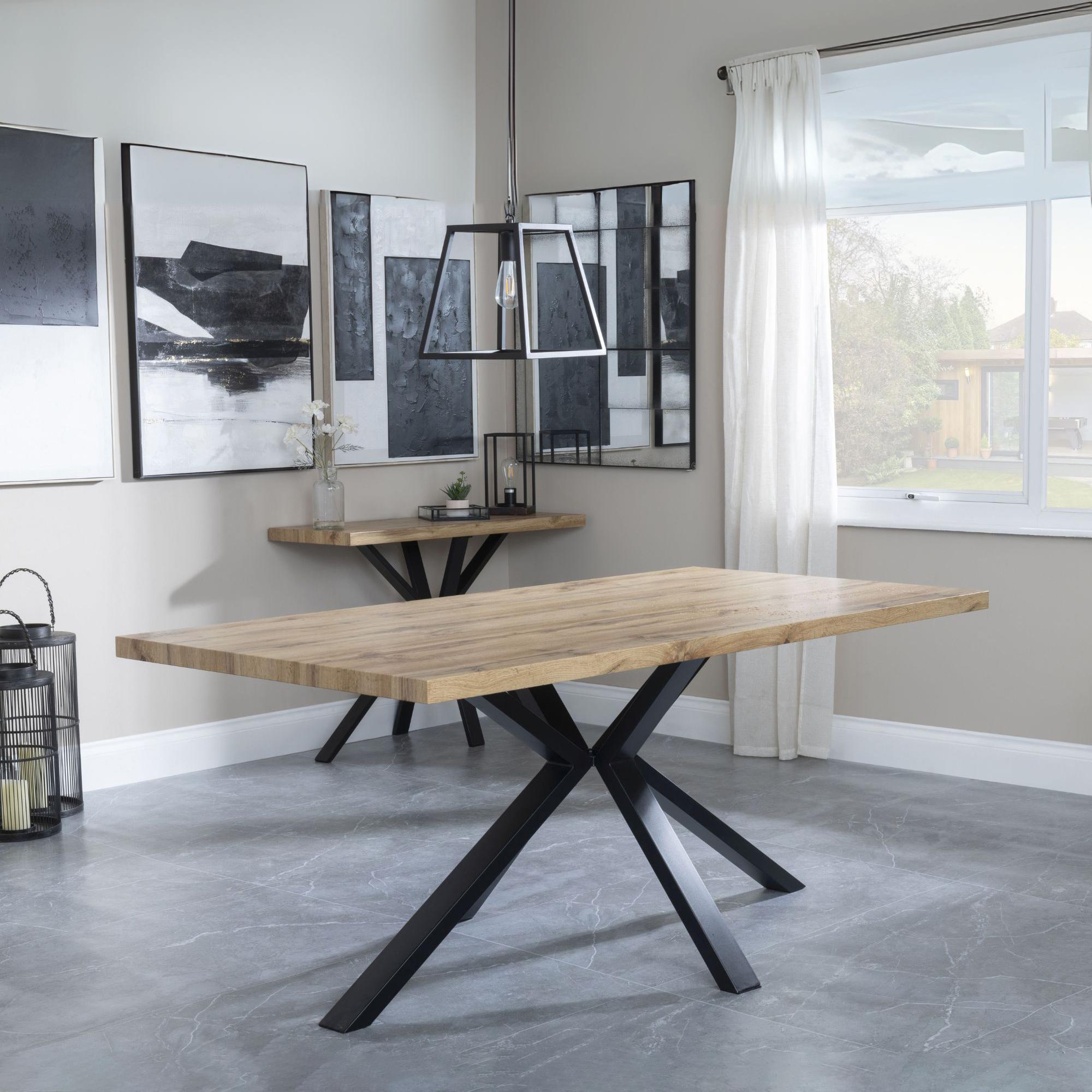 Product photograph of Bronx Industrial Oak Effect 6 Seater Dining Table With Black Spider Legs from Choice Furniture Superstore.