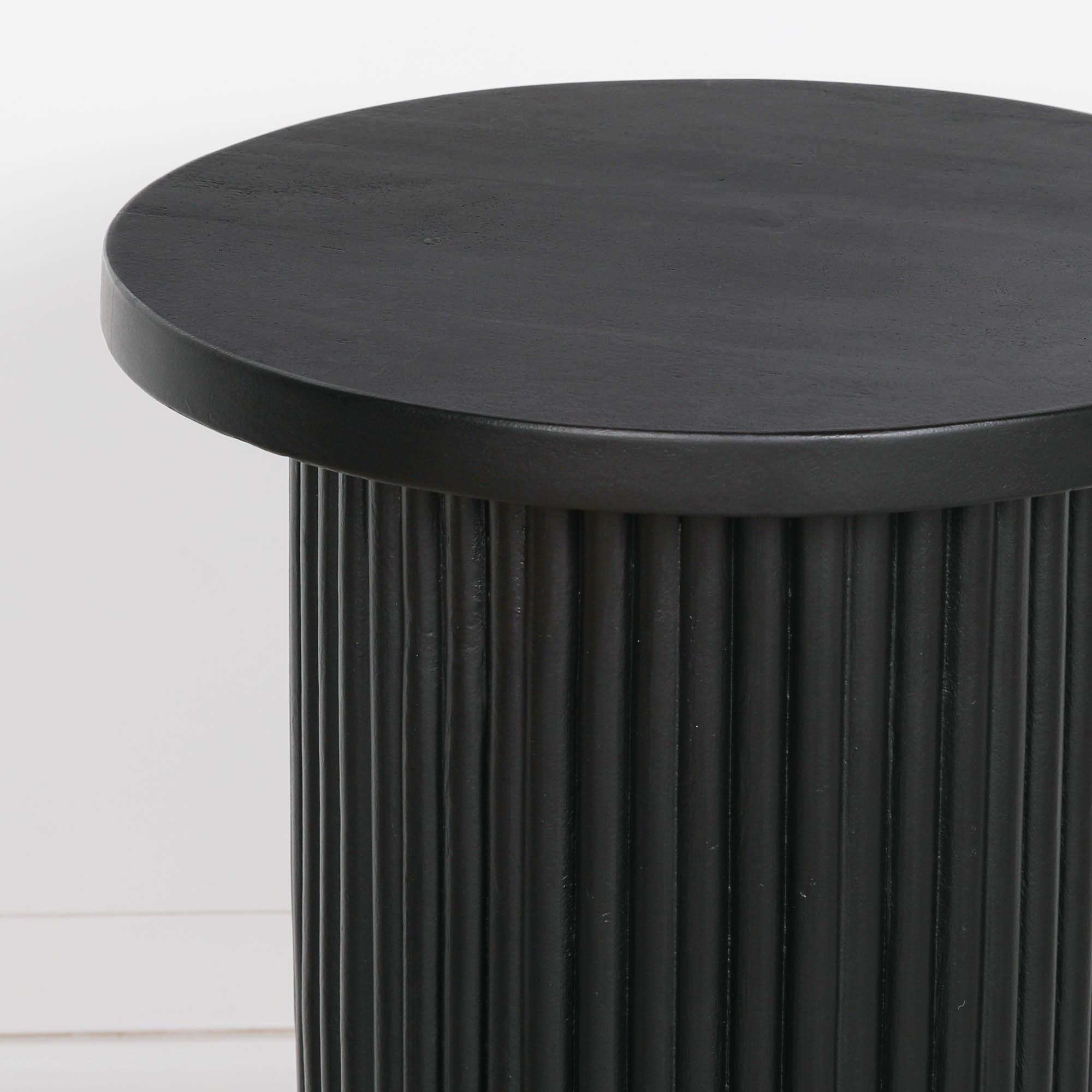 Product photograph of Ribbed Black Round Occasional Side Table from Choice Furniture Superstore.