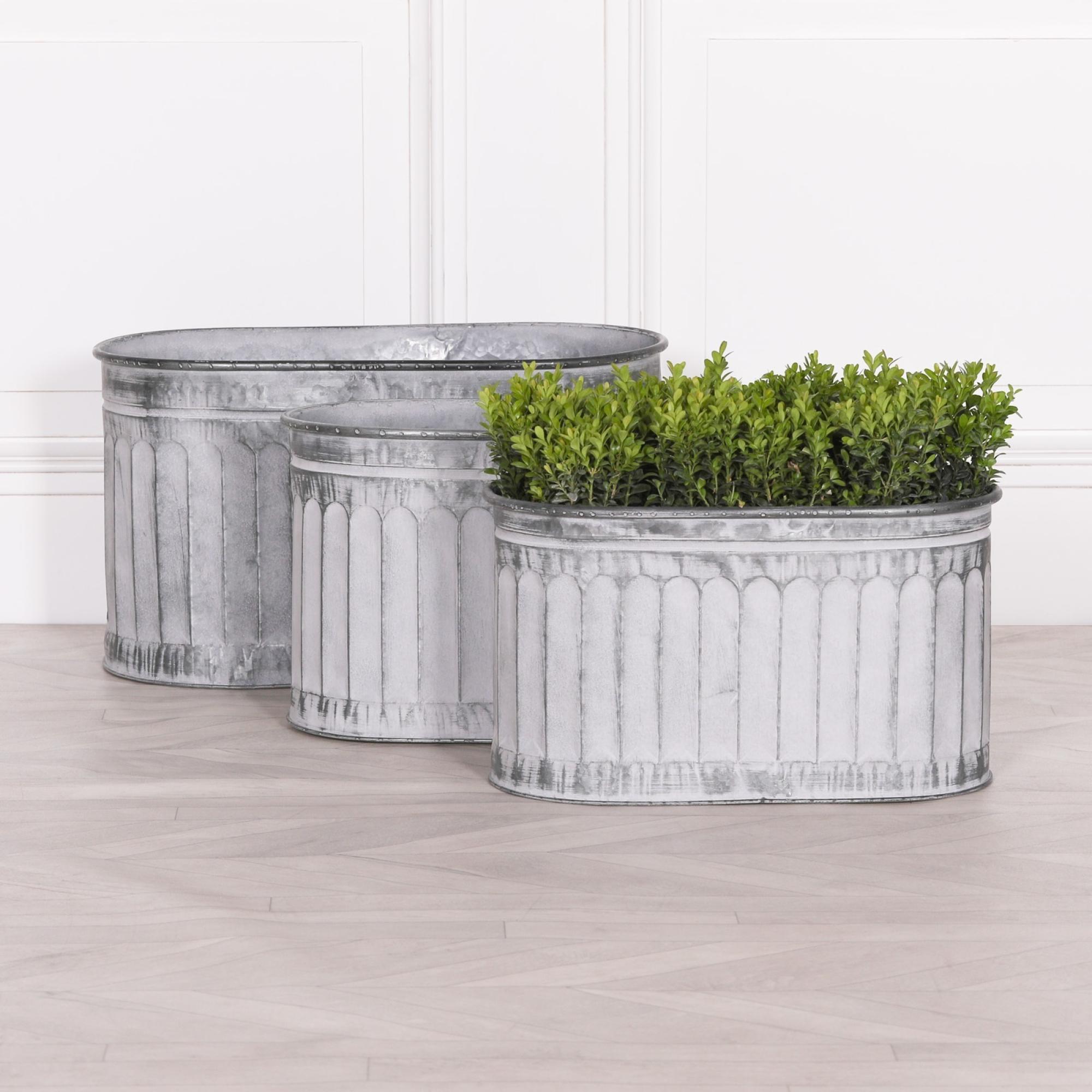 Product photograph of Arched Pattern Metal Large Planter from Choice Furniture Superstore.