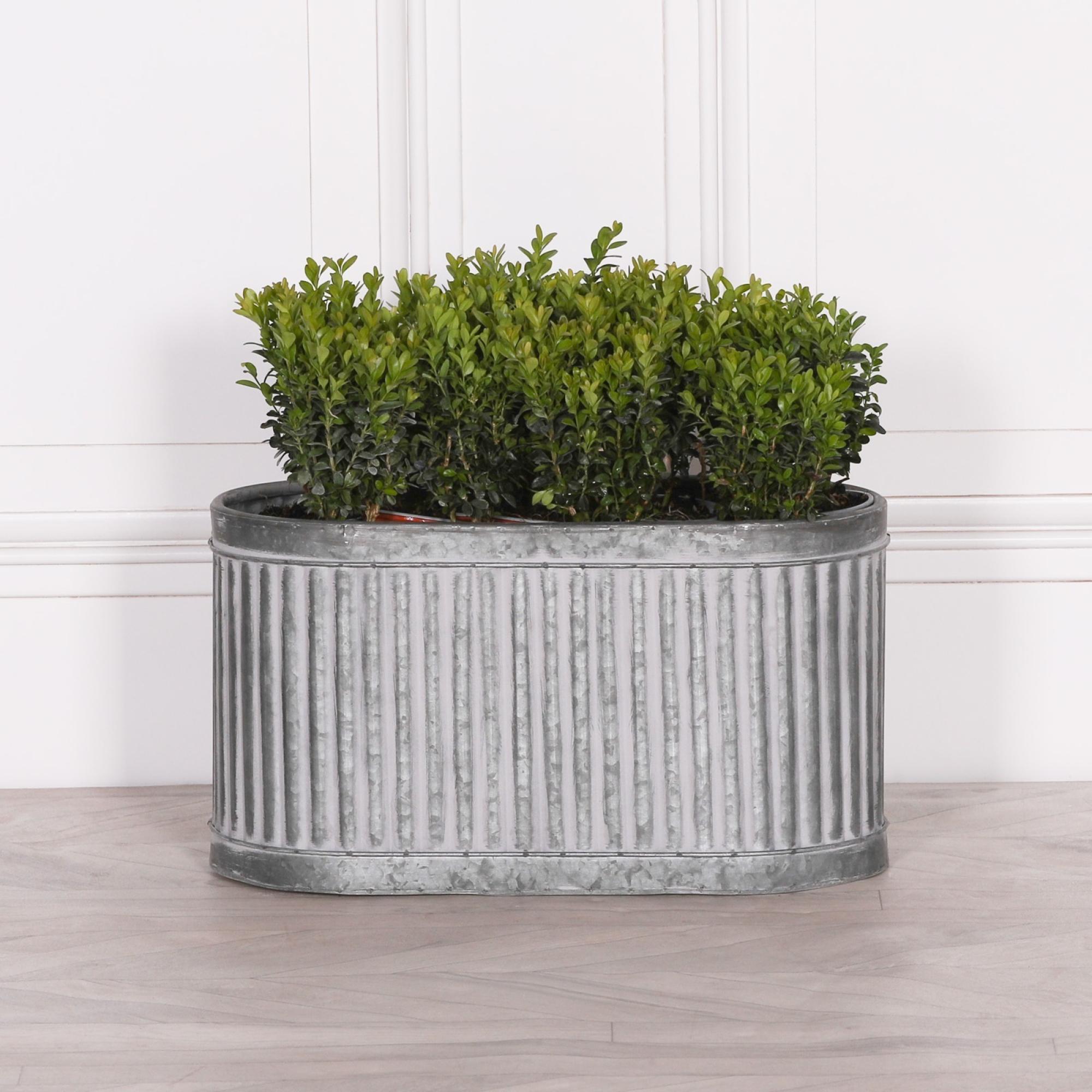 Product photograph of Ribbed Metal Large Planter from Choice Furniture Superstore.