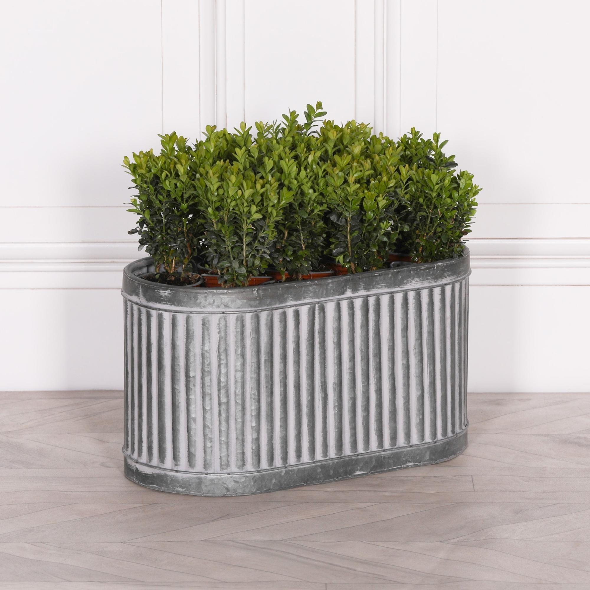 Product photograph of Ribbed Metal Large Planter from Choice Furniture Superstore.