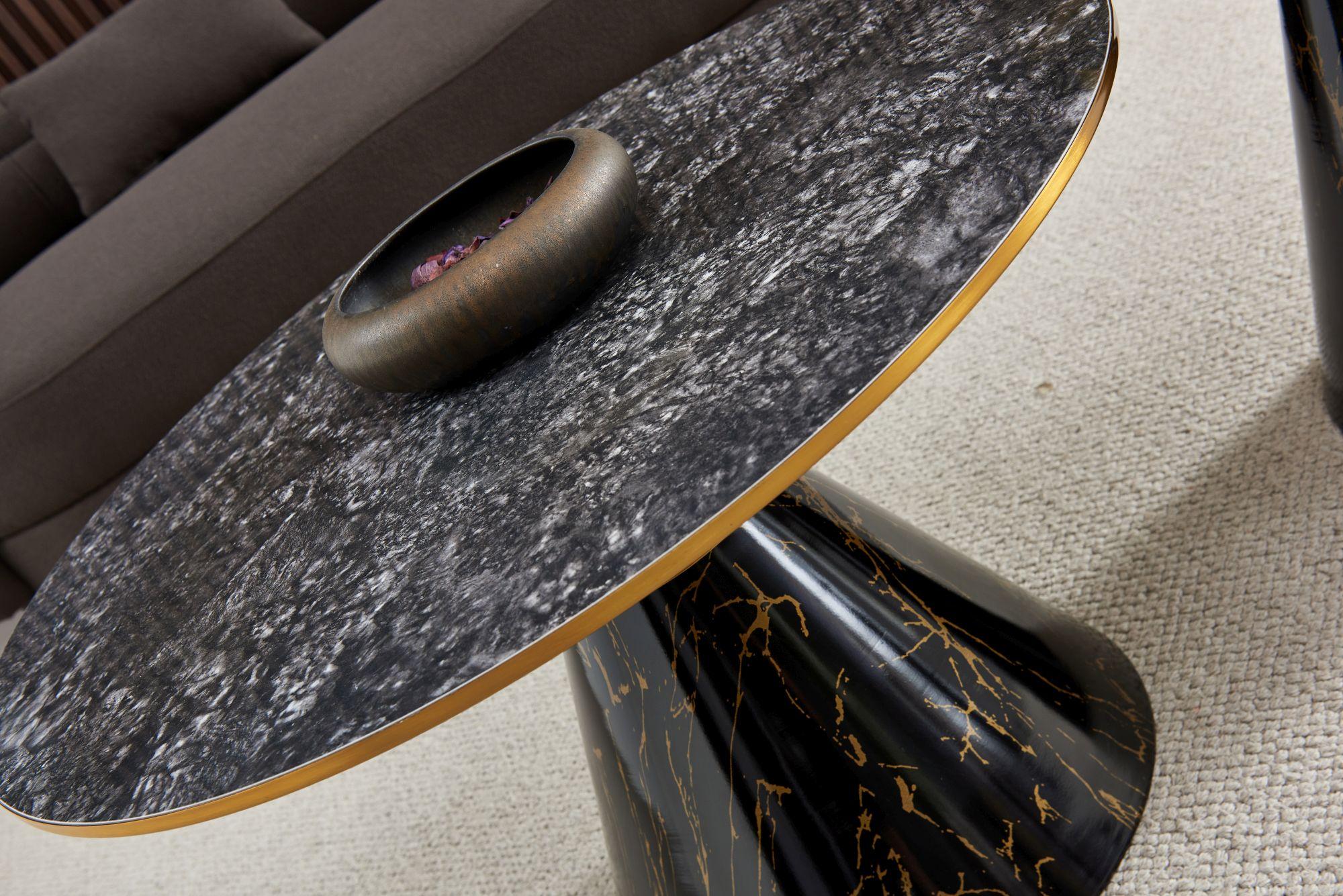 Product photograph of Funnel Black Ceramic Round Coffee Table With Gold Trim from Choice Furniture Superstore.