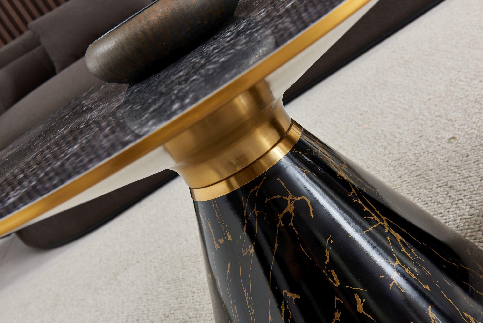 Product photograph of Funnel Black Ceramic Round Coffee Table With Gold Trim from Choice Furniture Superstore.