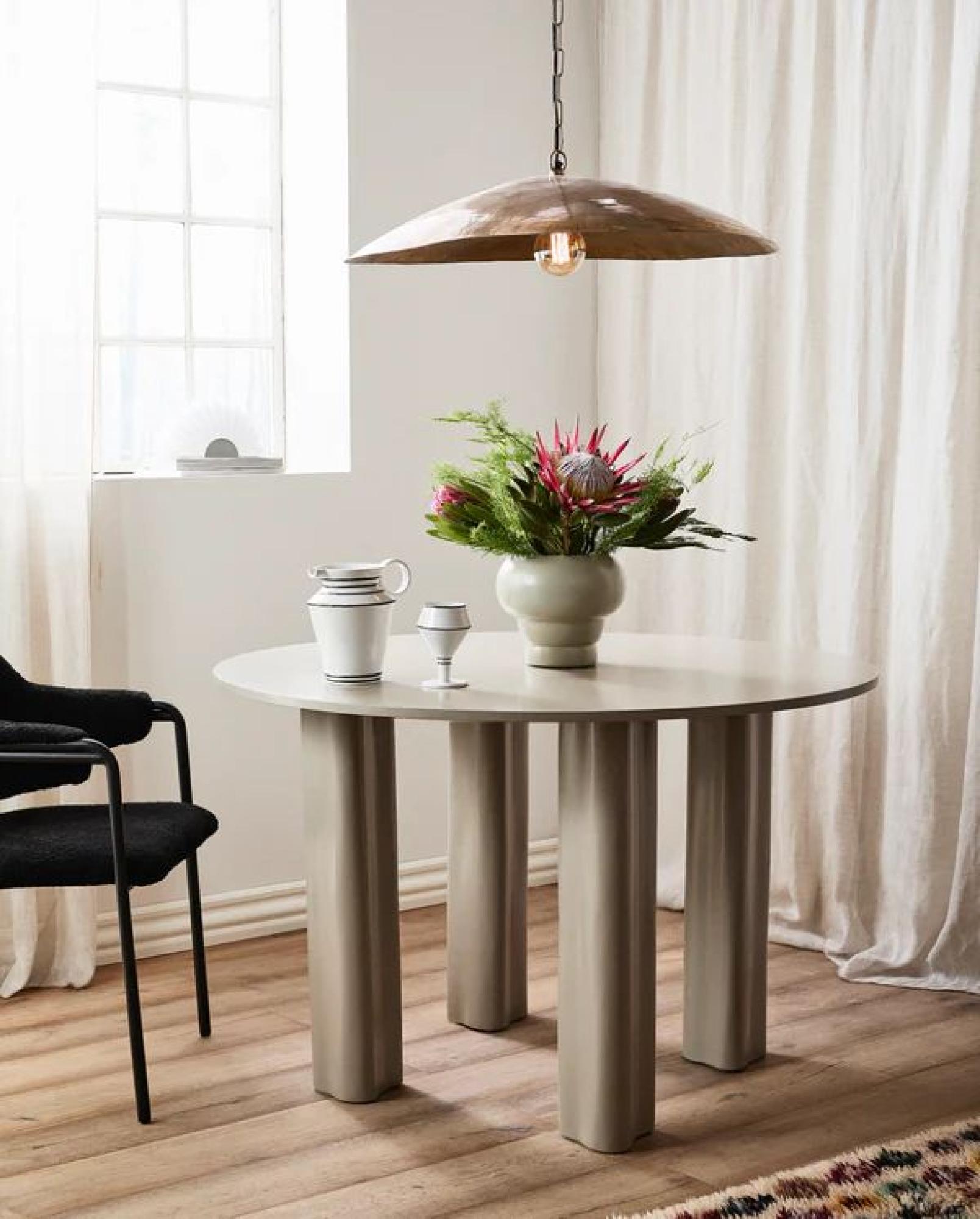 Product photograph of Nordal Envo Beige 4 Seater Round Dining Table from Choice Furniture Superstore.