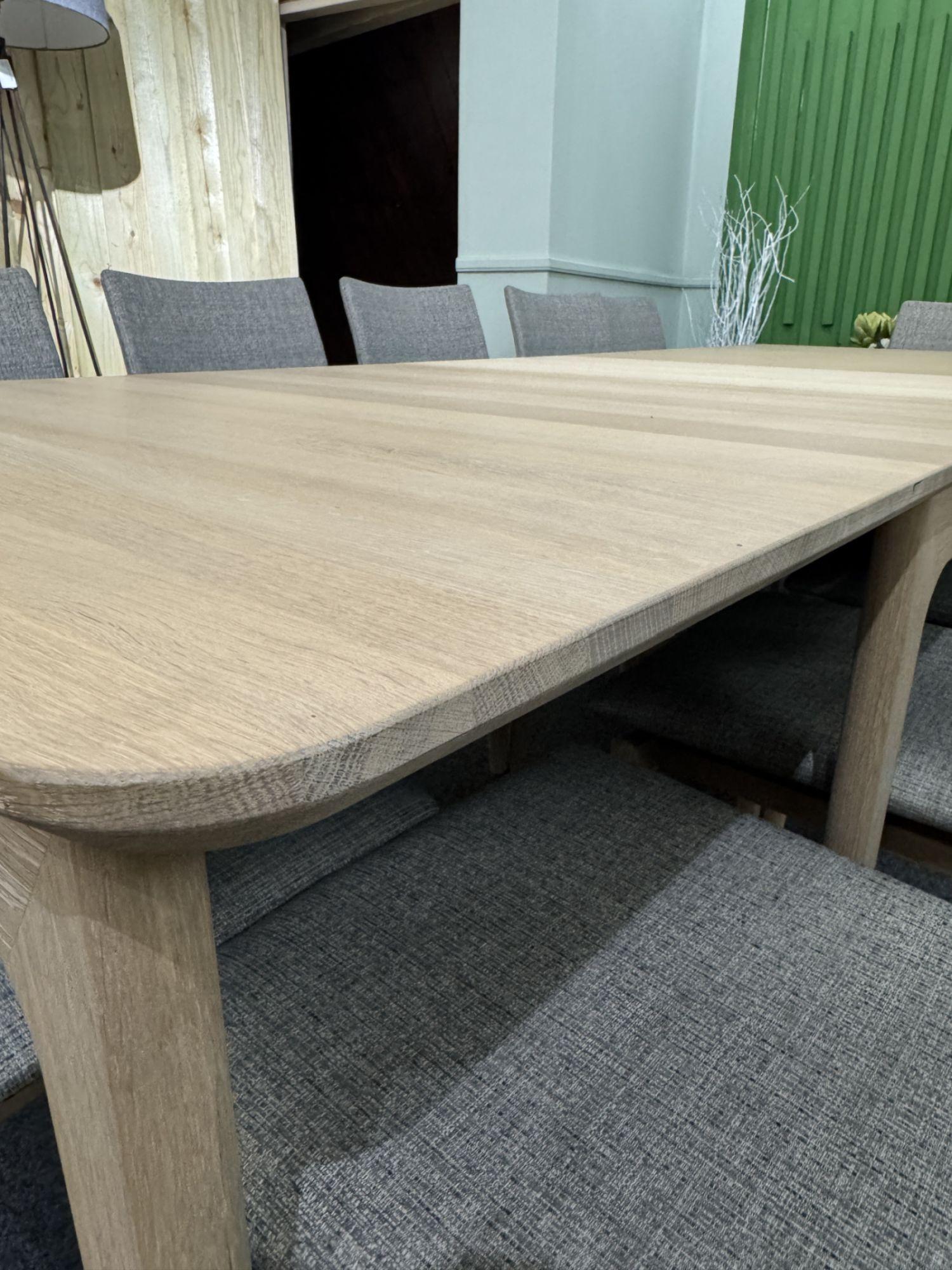 Product photograph of Ex Display - Skovby Sm27 Oak 8-20 Seater Extending Dining Table from Choice Furniture Superstore.