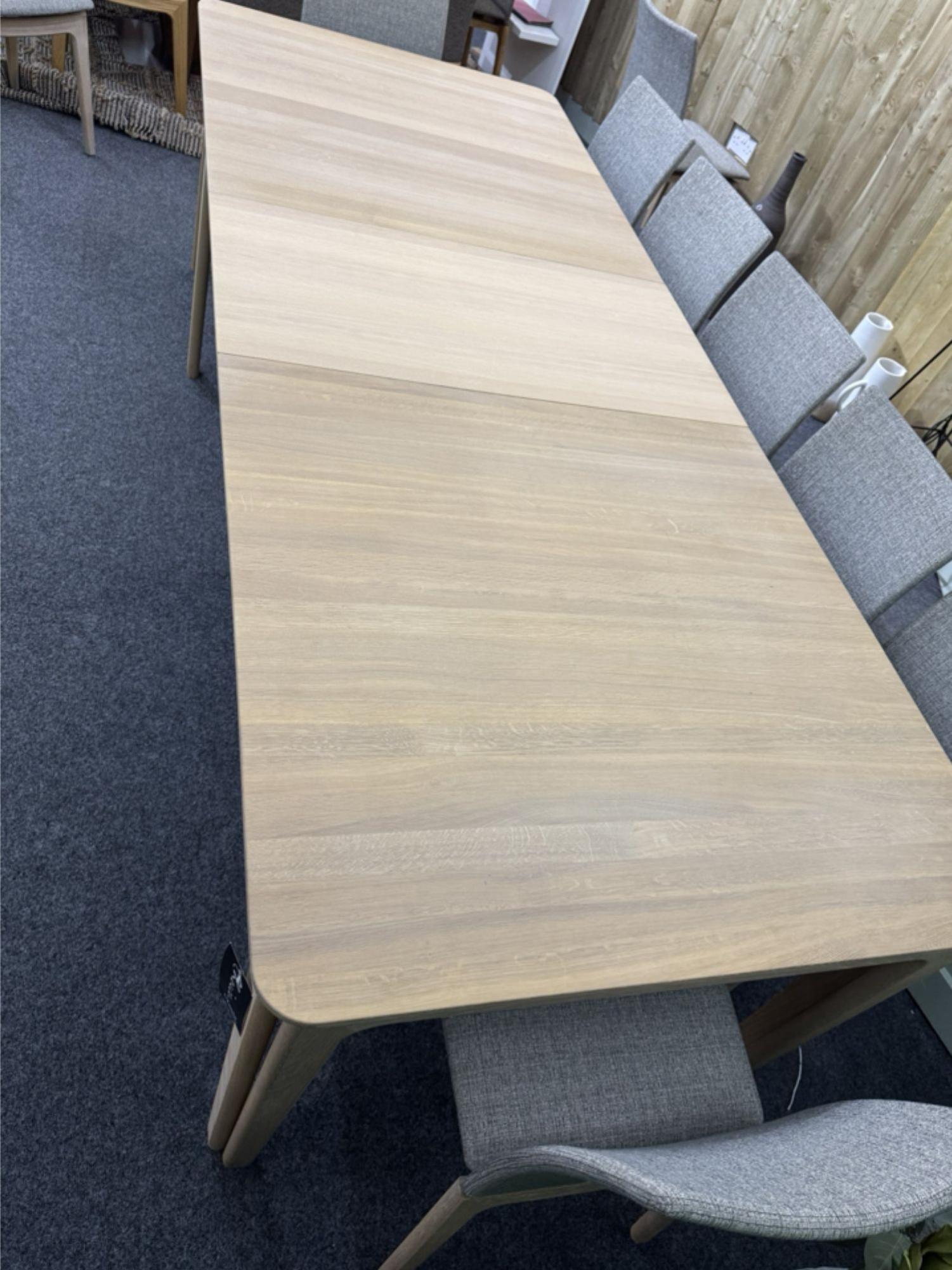 Product photograph of Ex Display - Skovby Sm27 Oak 8-20 Seater Extending Dining Table from Choice Furniture Superstore.