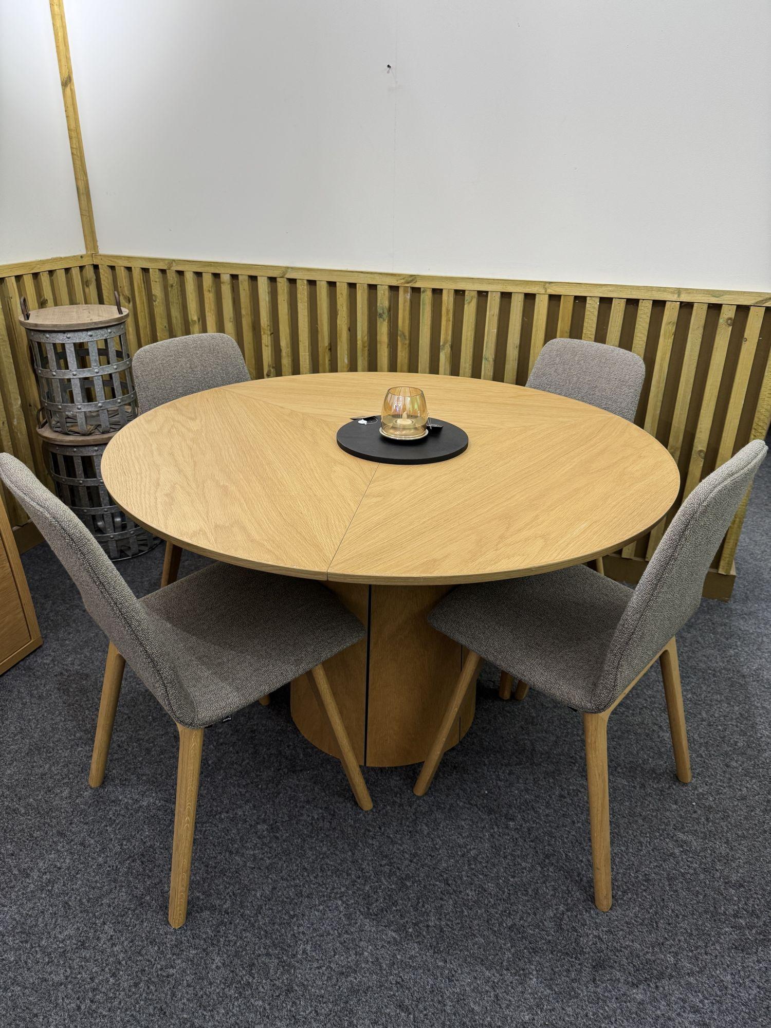 Product photograph of Ex Display - Skovby Sm33 Oak Round 4 Seater Extending Dining Set With Sm92 4 Chairs from Choice Furniture Superstore.